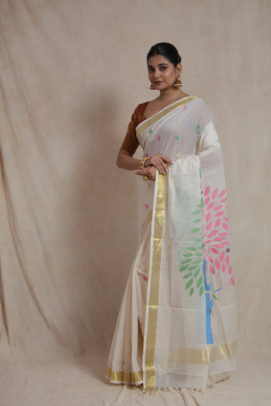 Front pose of off white Kanchipuram cotton saree with golden zari border