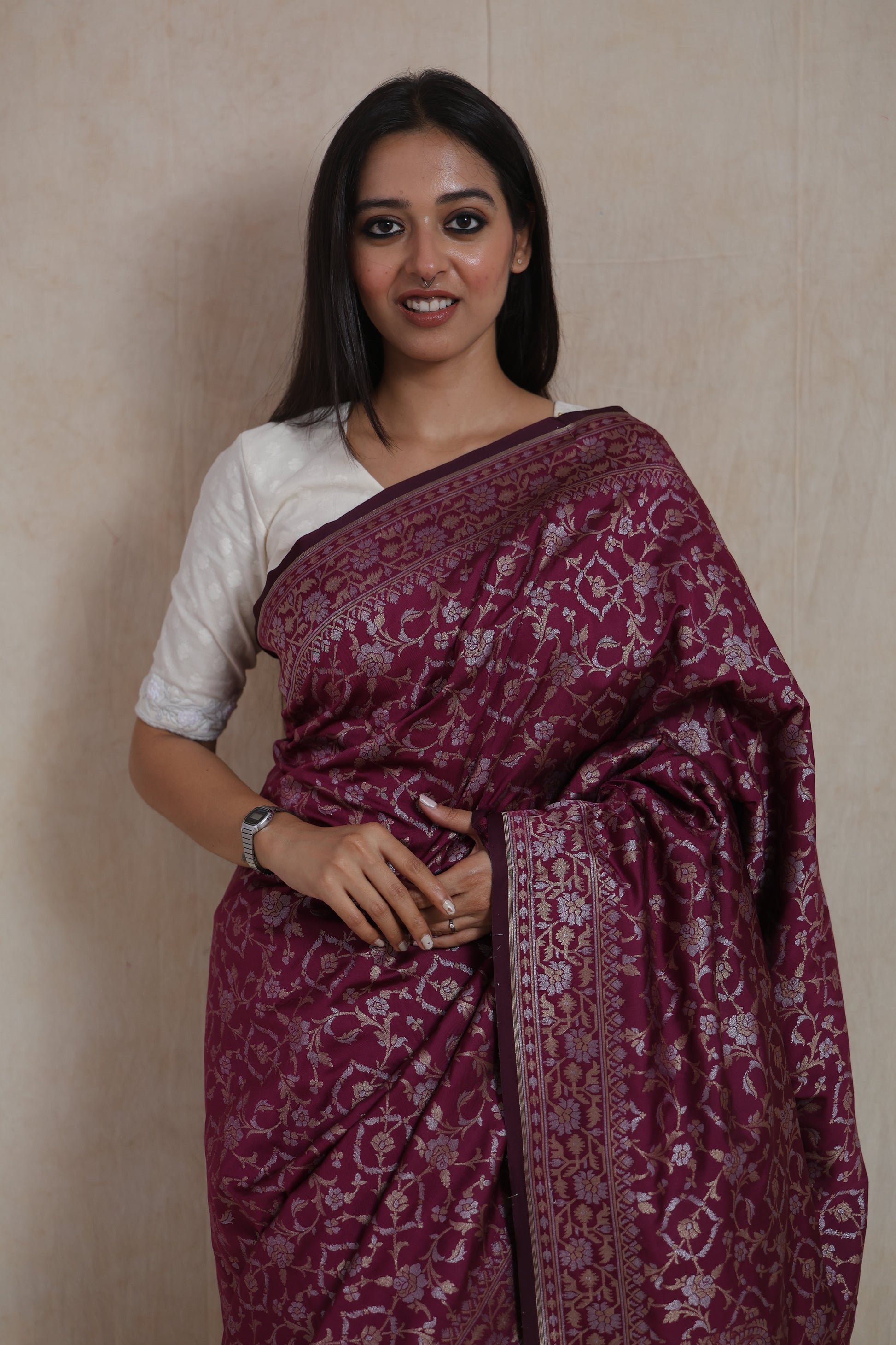 Front view of royal wine Banarasi art silk saree with floral zari motifs