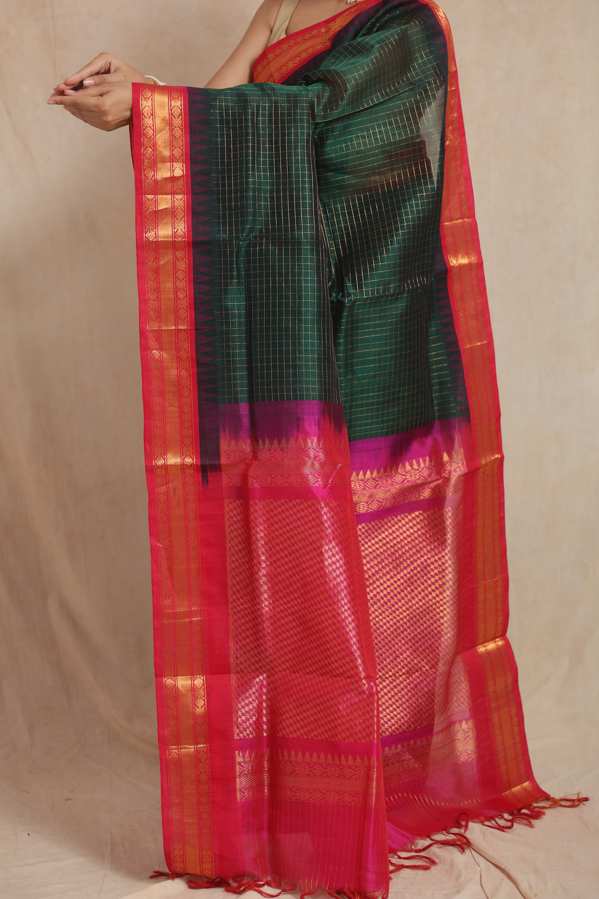 Close-up view of green Kanchipuram Sico saree with zari woven pallu