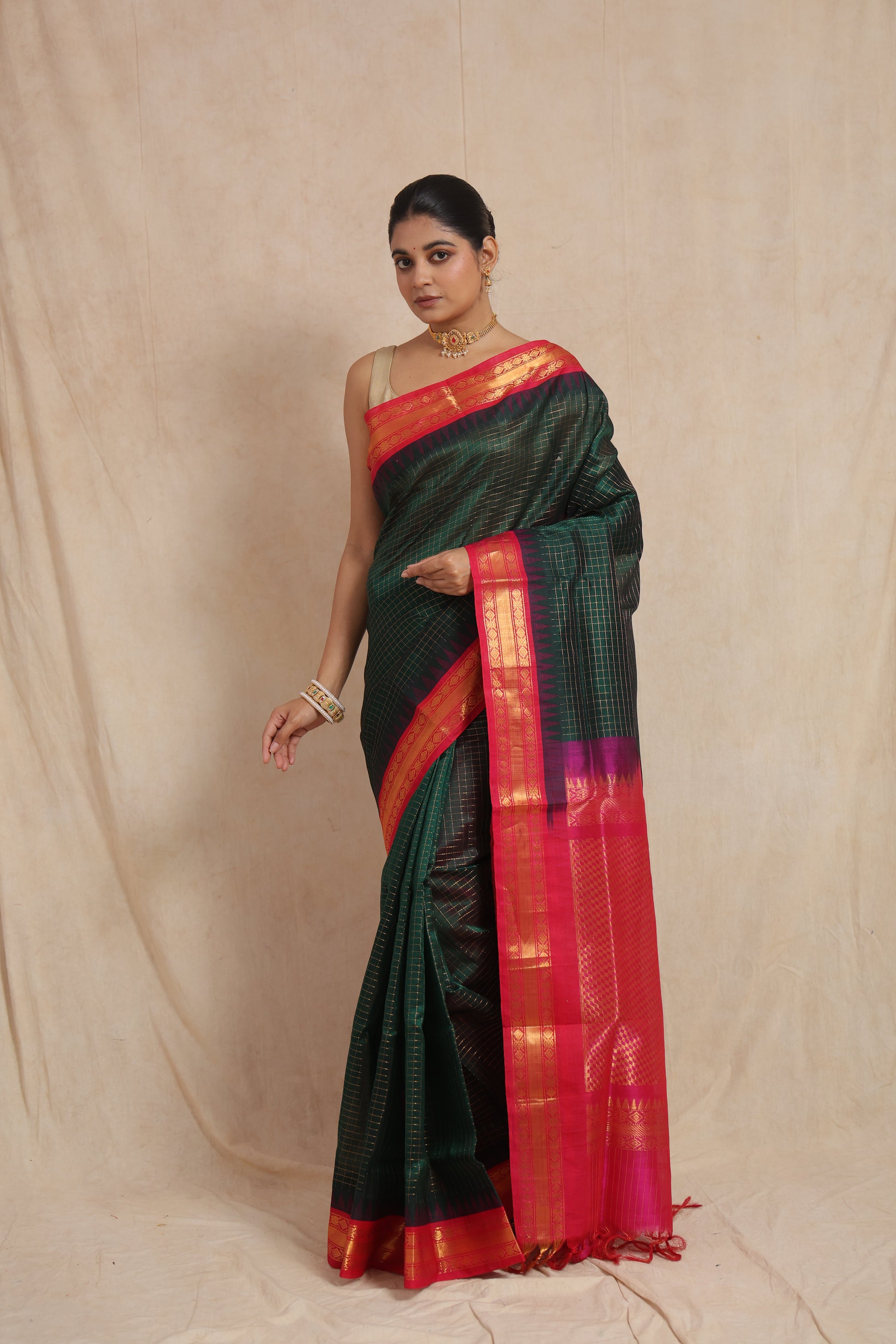 Front drape view of emerald green Kanchipuram Sico saree