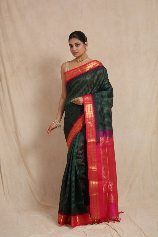 Front drape view of emerald green Kanchipuram Sico saree