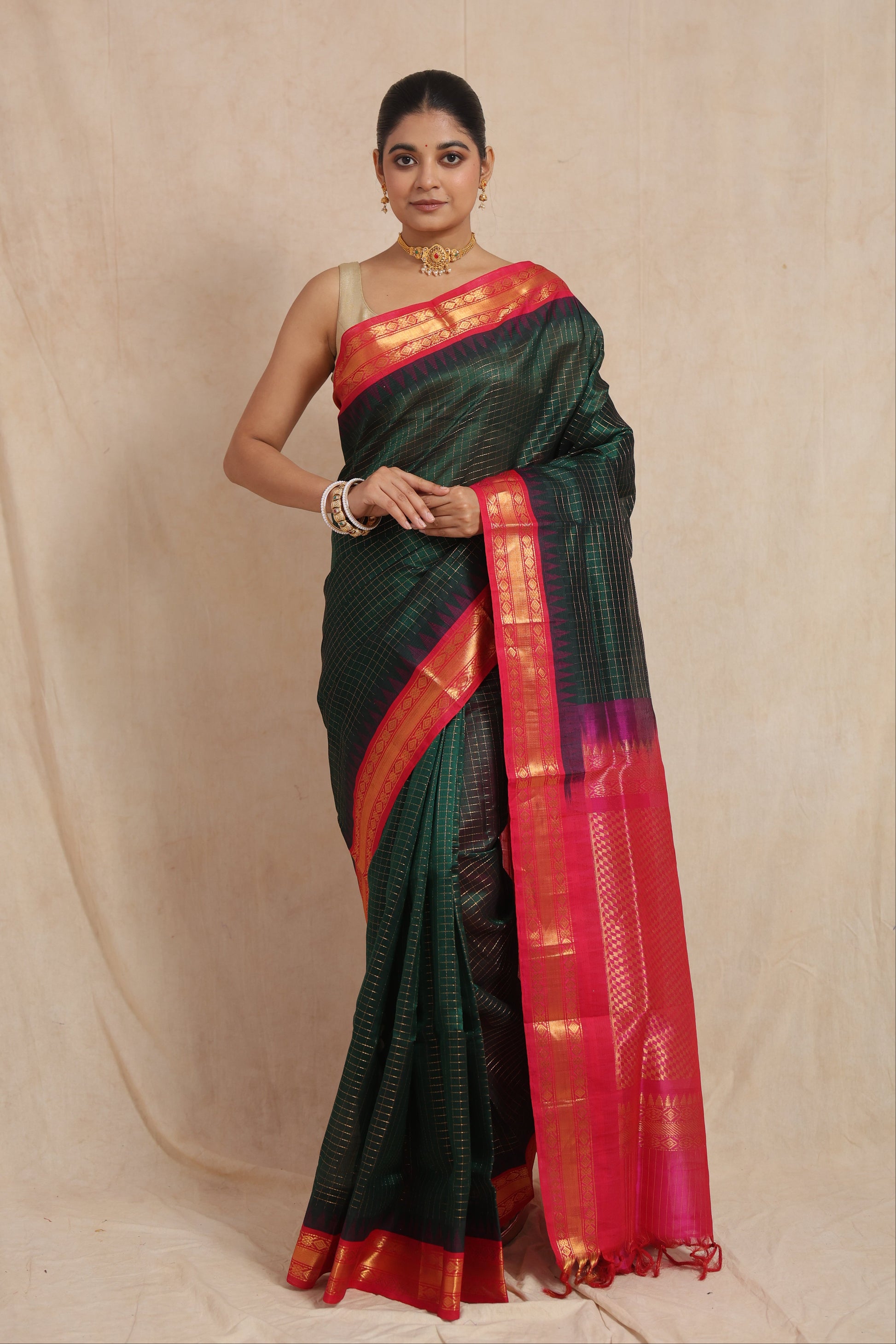 Full drape view of green Kanchipuram Sico saree with zari checks