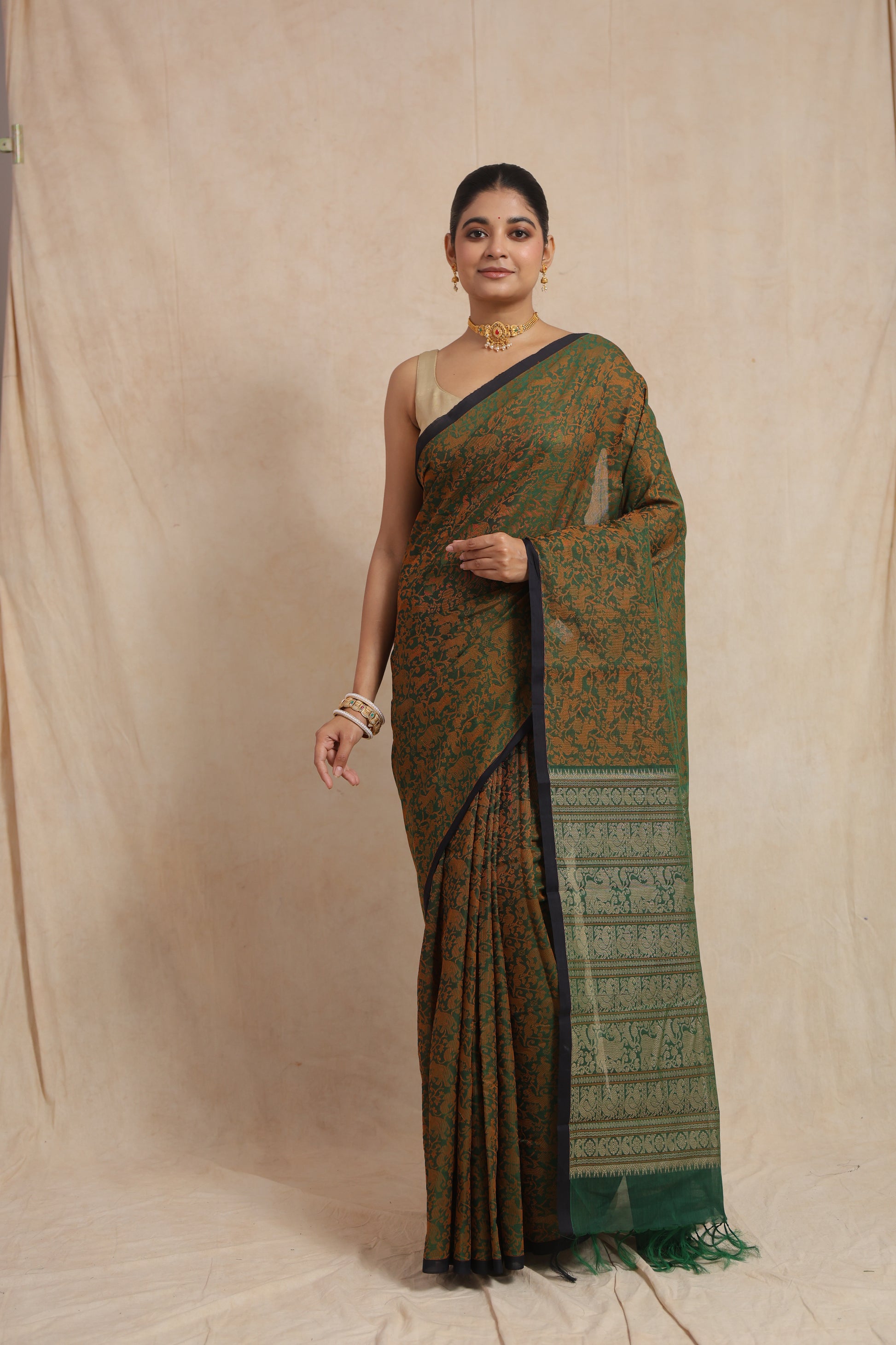 Front view of emerald green Kanchipuram cotton saree