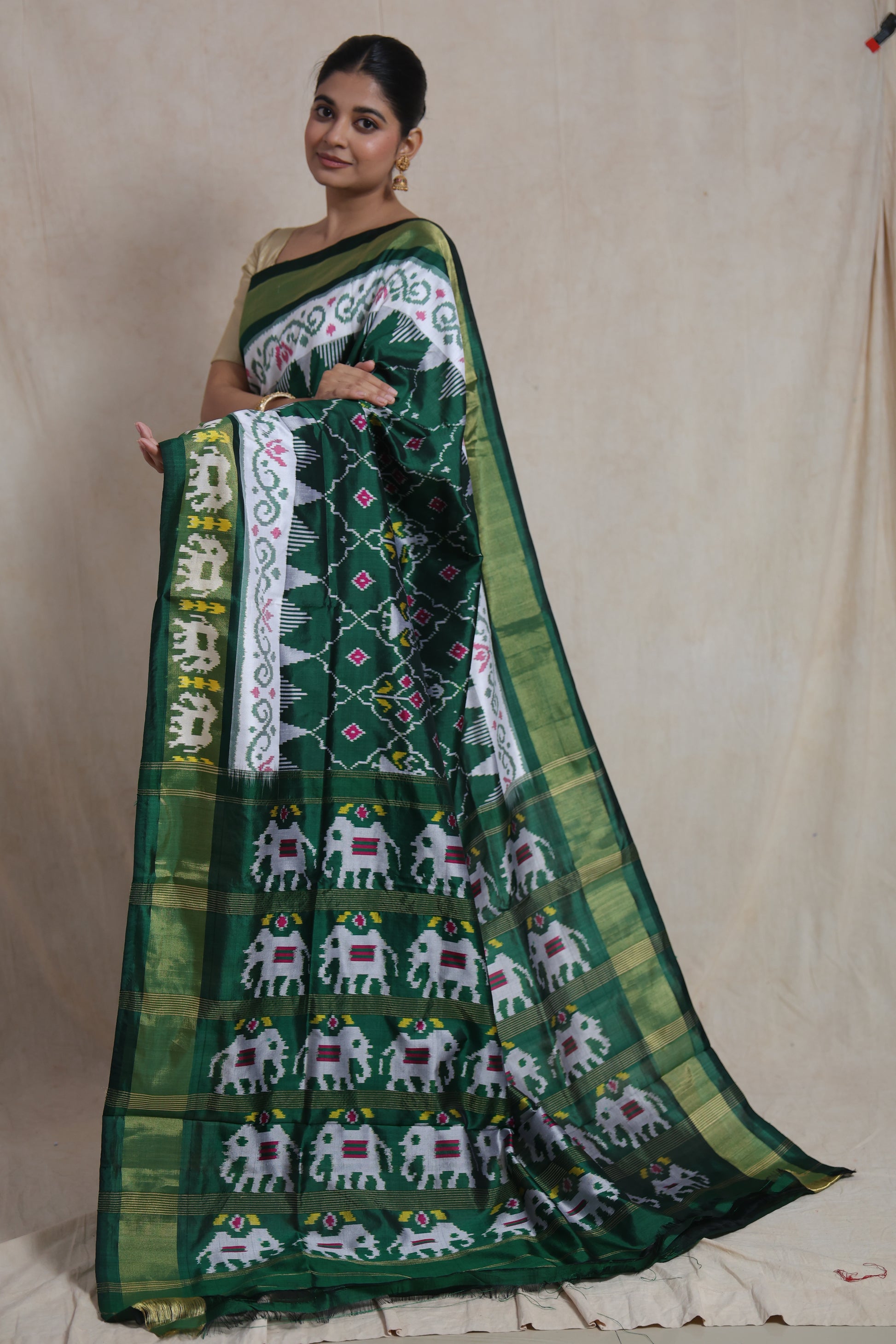 Full pallu display of emerald green Panchampali Silk saree with traditional woven motifs