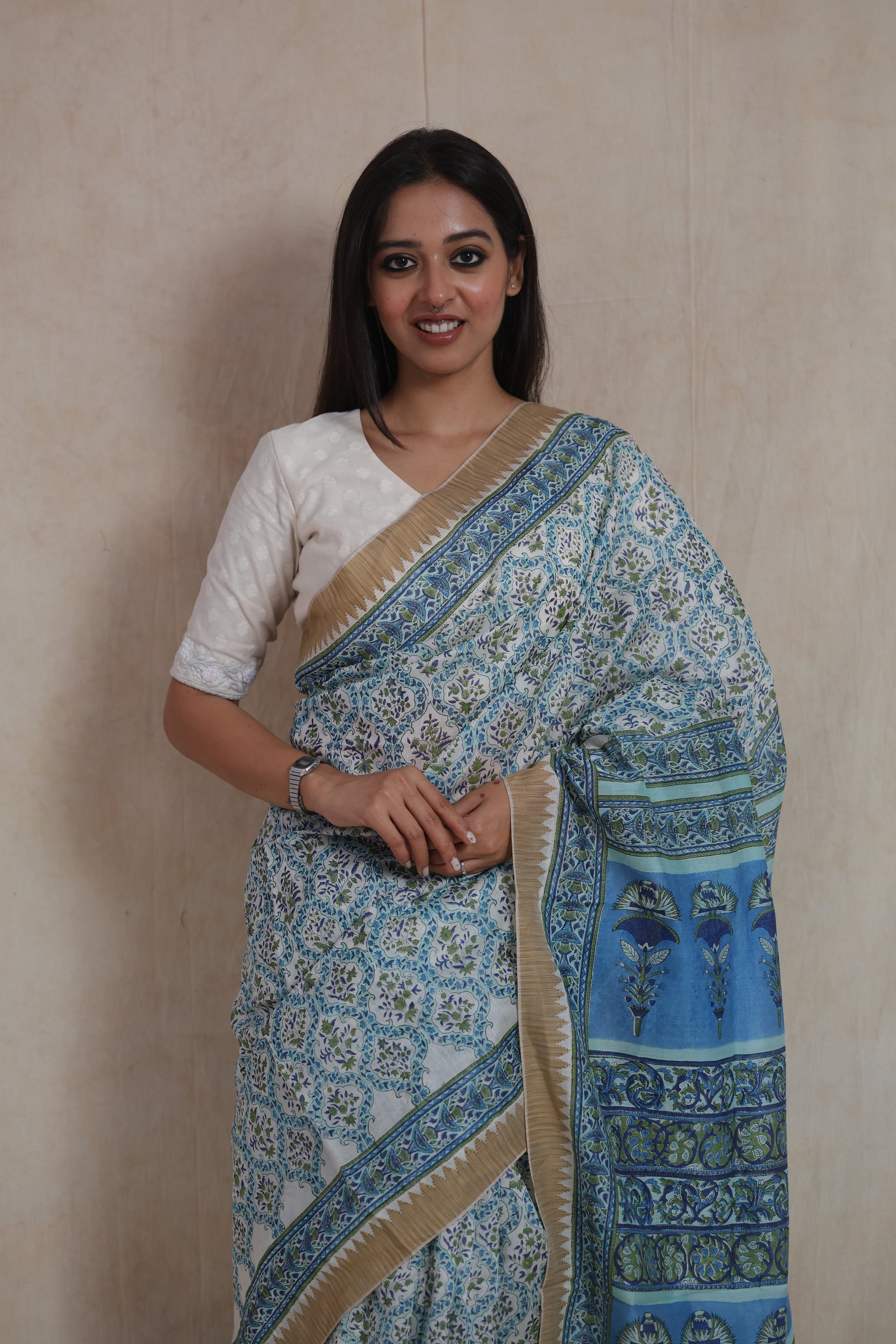 Full look of Sanghnaree SICO saree featuring blue floral motifs and detailed pallu
