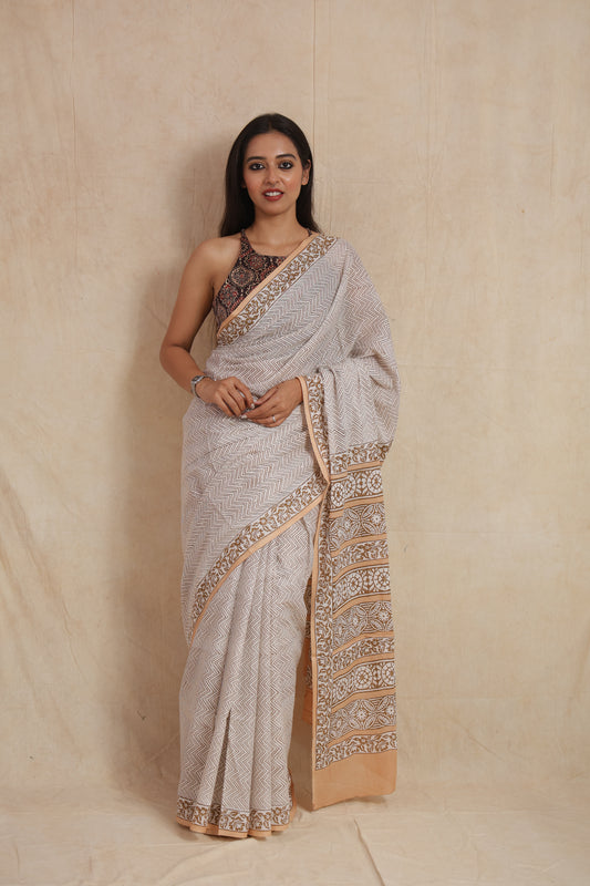 Full front view of beige and white Sanganeri cotton saree