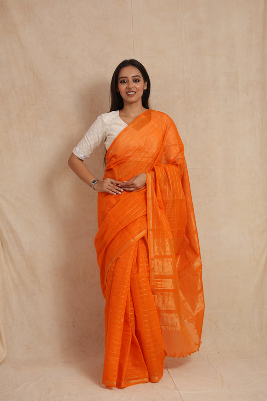 Full-length view of orange Kanchipuram handloom cotton saree with woven pallu