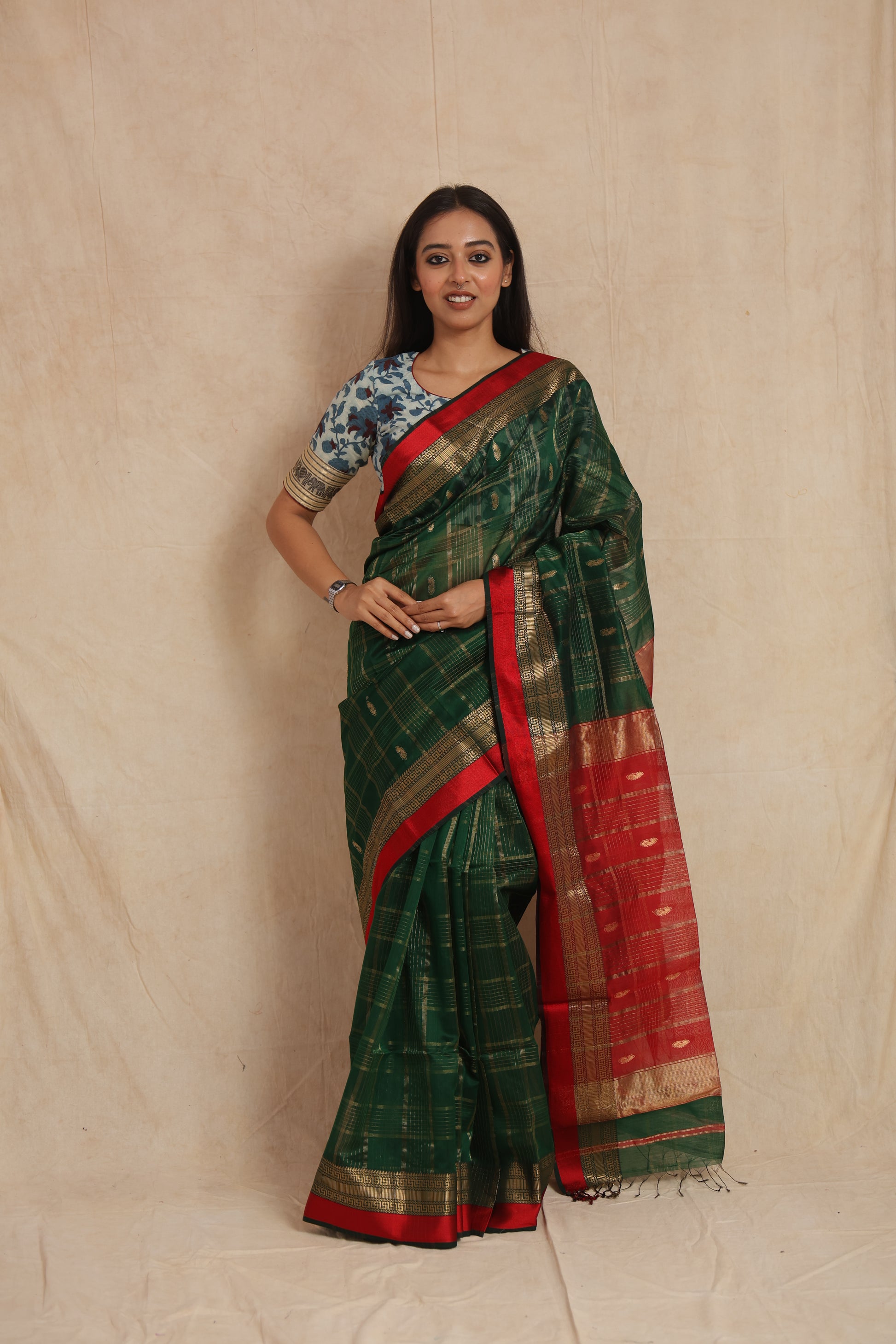 Full front view of green Maheshwari cotton saree with traditional woven pallu