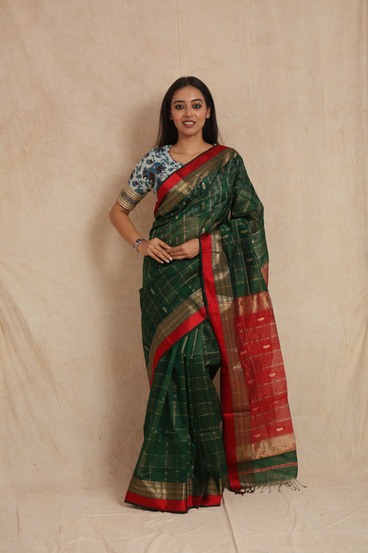 Full front view of green Maheshwari cotton saree with traditional woven pallu