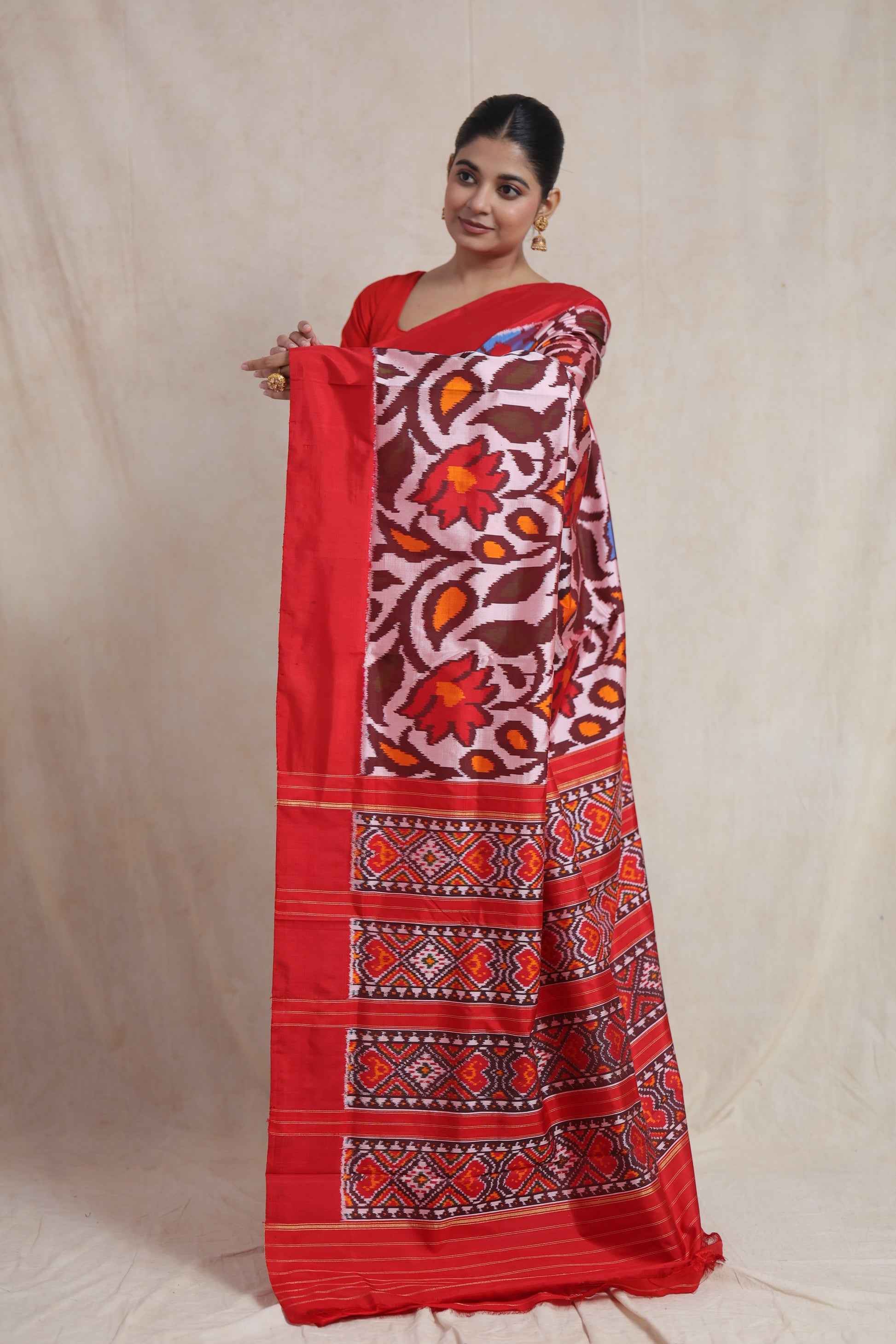 Handwoven Panchampali silk saree featuring floral motifs and traditional geometric pallu design