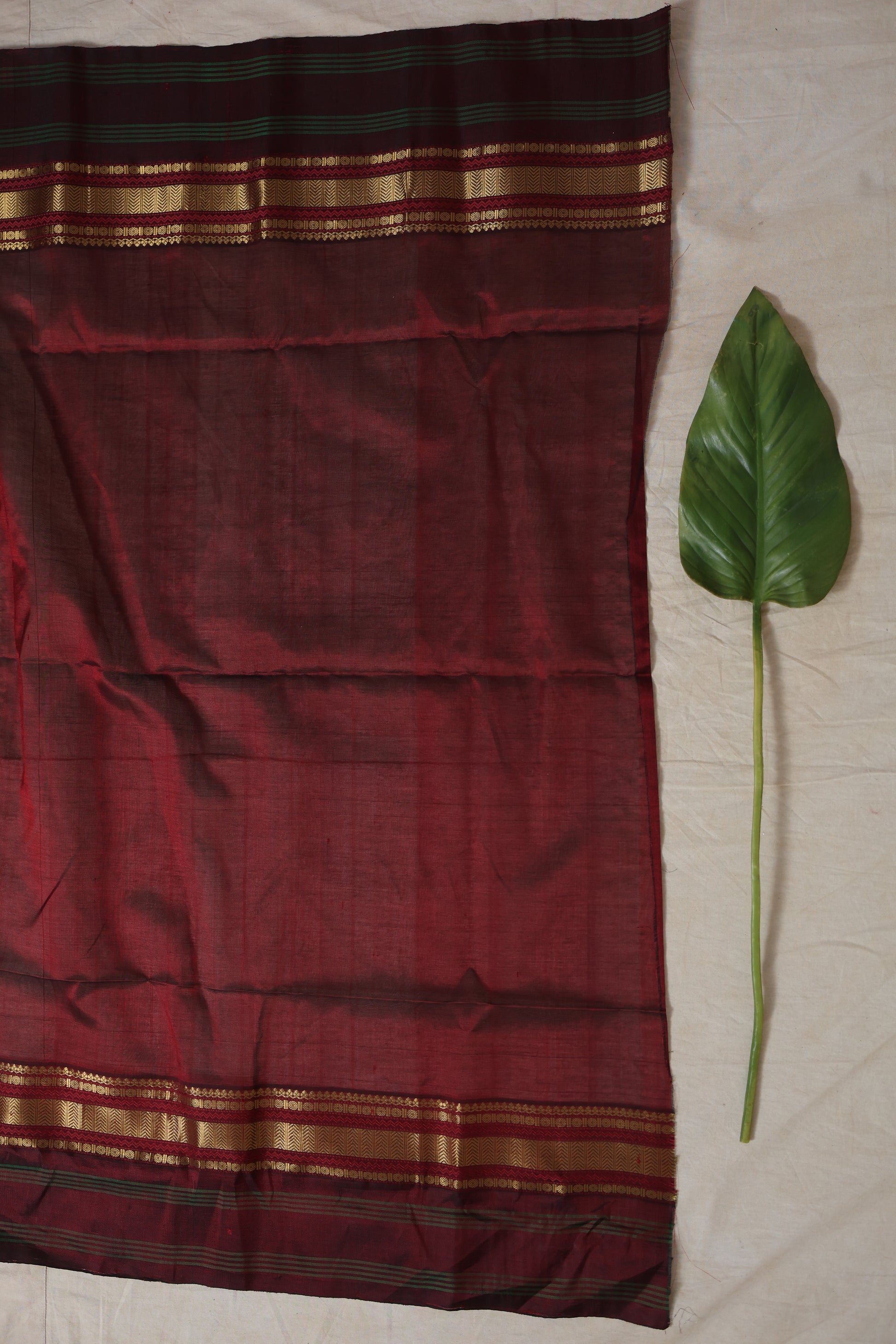 Handwoven Kanchipuram silk cotton saree with elegant striped body