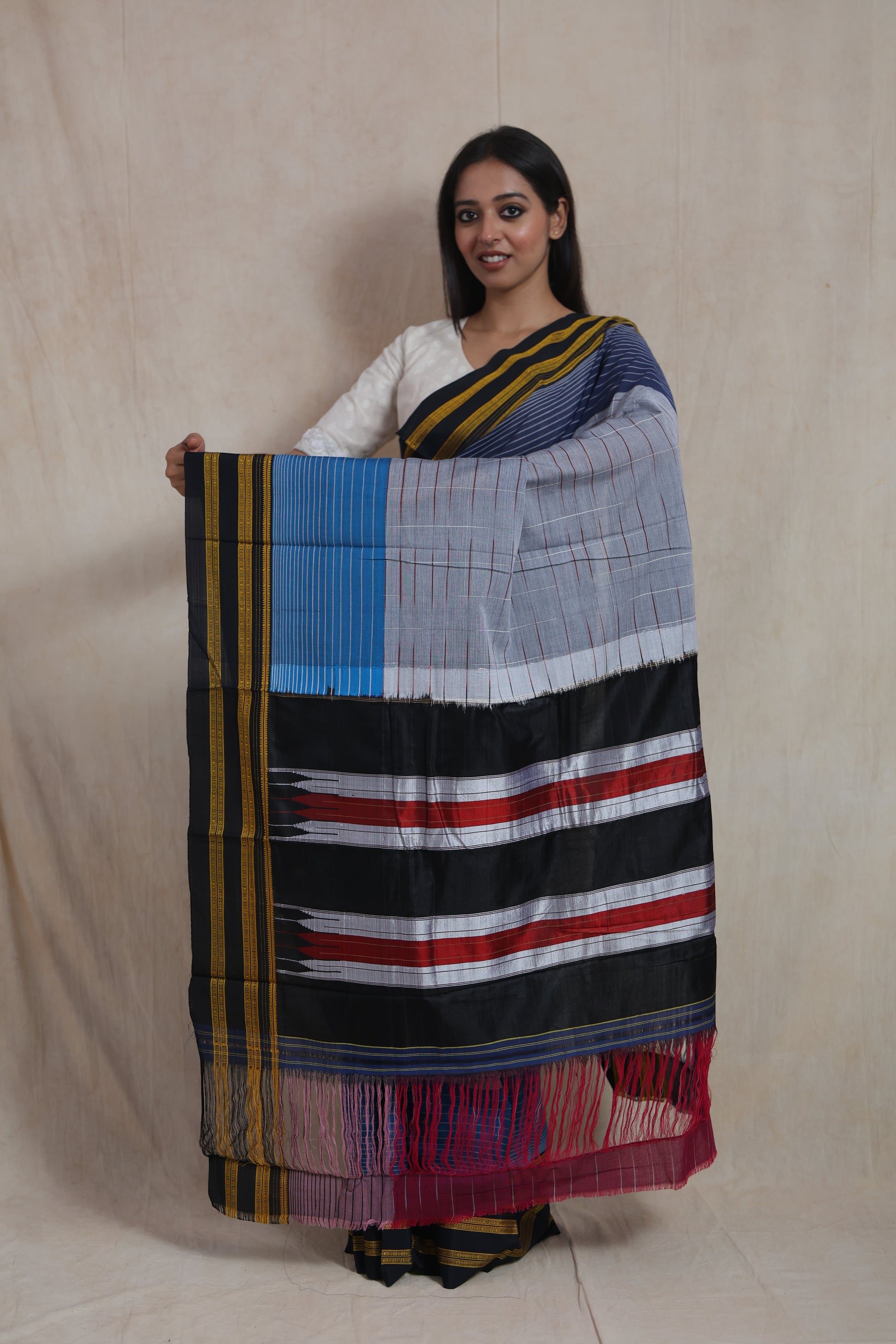 Full display of traditional Ilkal saree pallu with red, black, and silver woven patterns