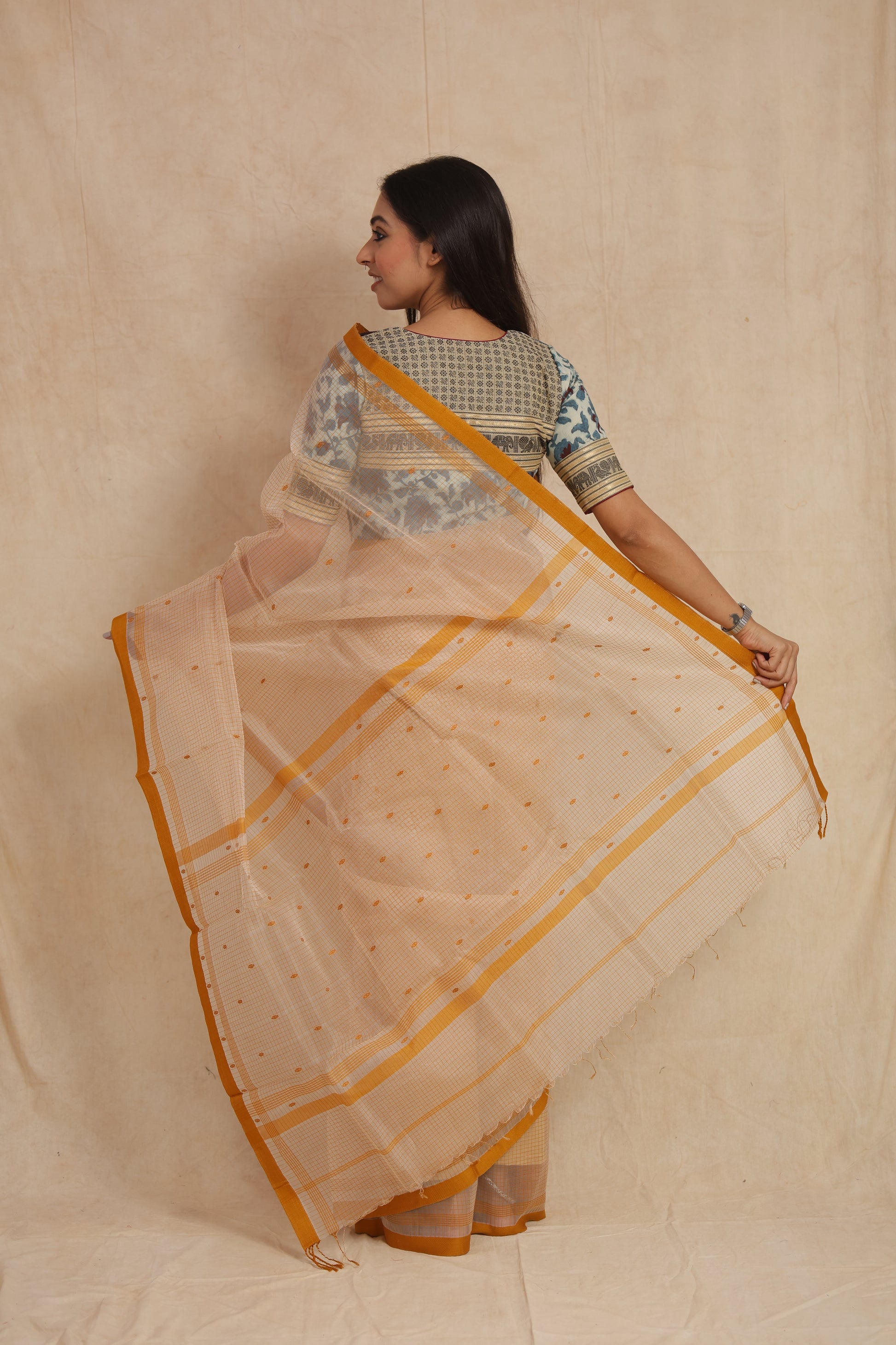 Back view of ivory Maheshwari cotton saree with elegant checked weave