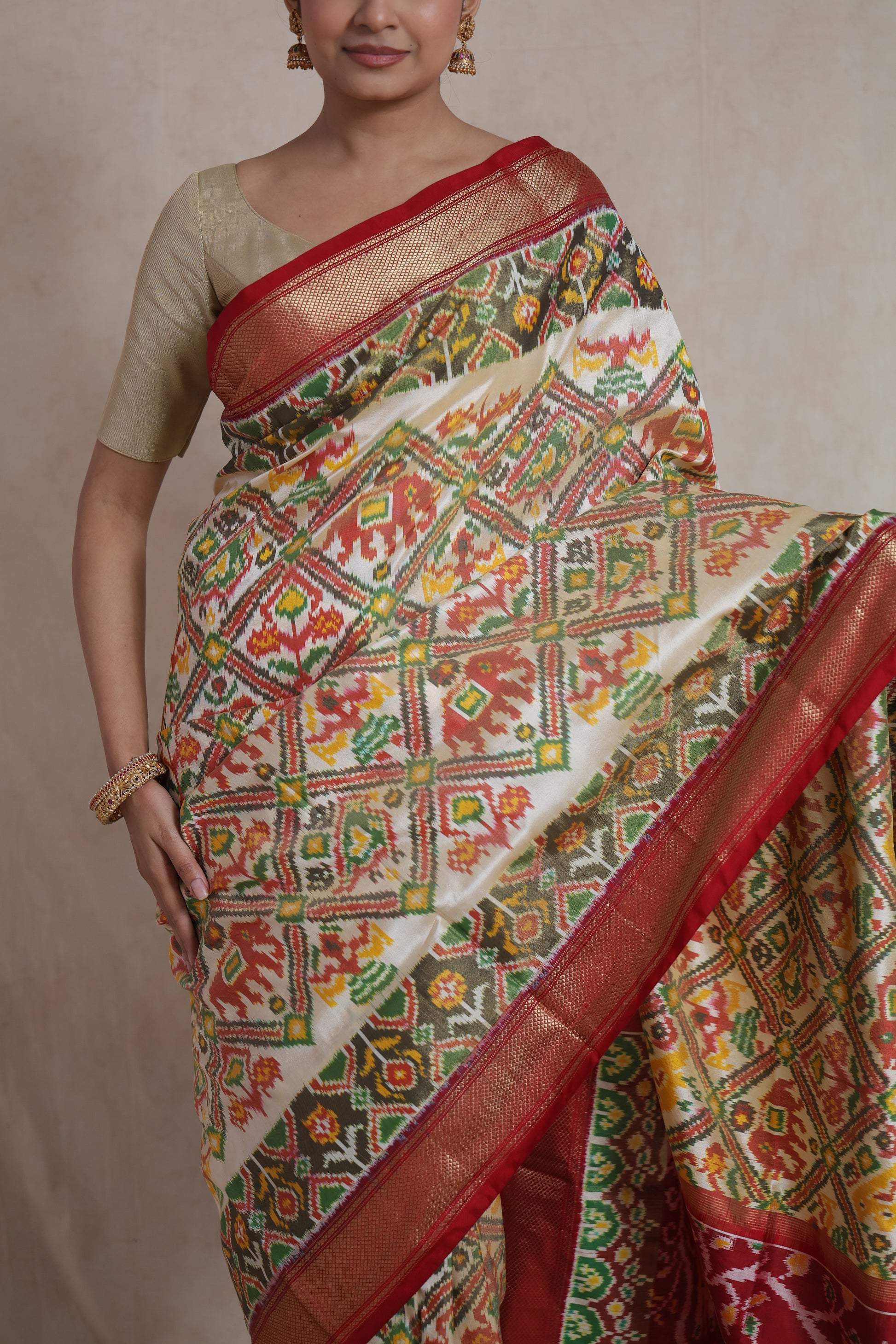 Close-up of ivory Panchampali silk saree with colorful traditional weaving