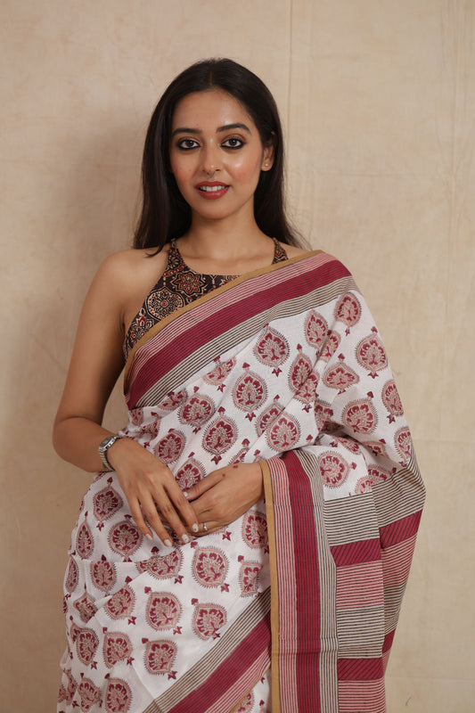 Portrait styling of ivory white Sanghnaree cotton saree with striped border