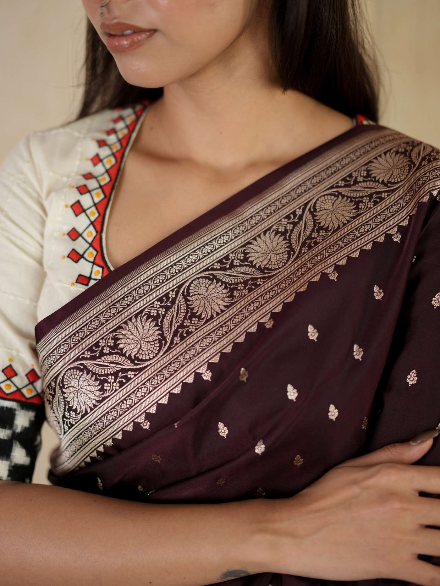 Dark brown Benarasi semi-silk saree with intricate patterns and a matching 1-meter blouse piece from Joyee Kolkata.