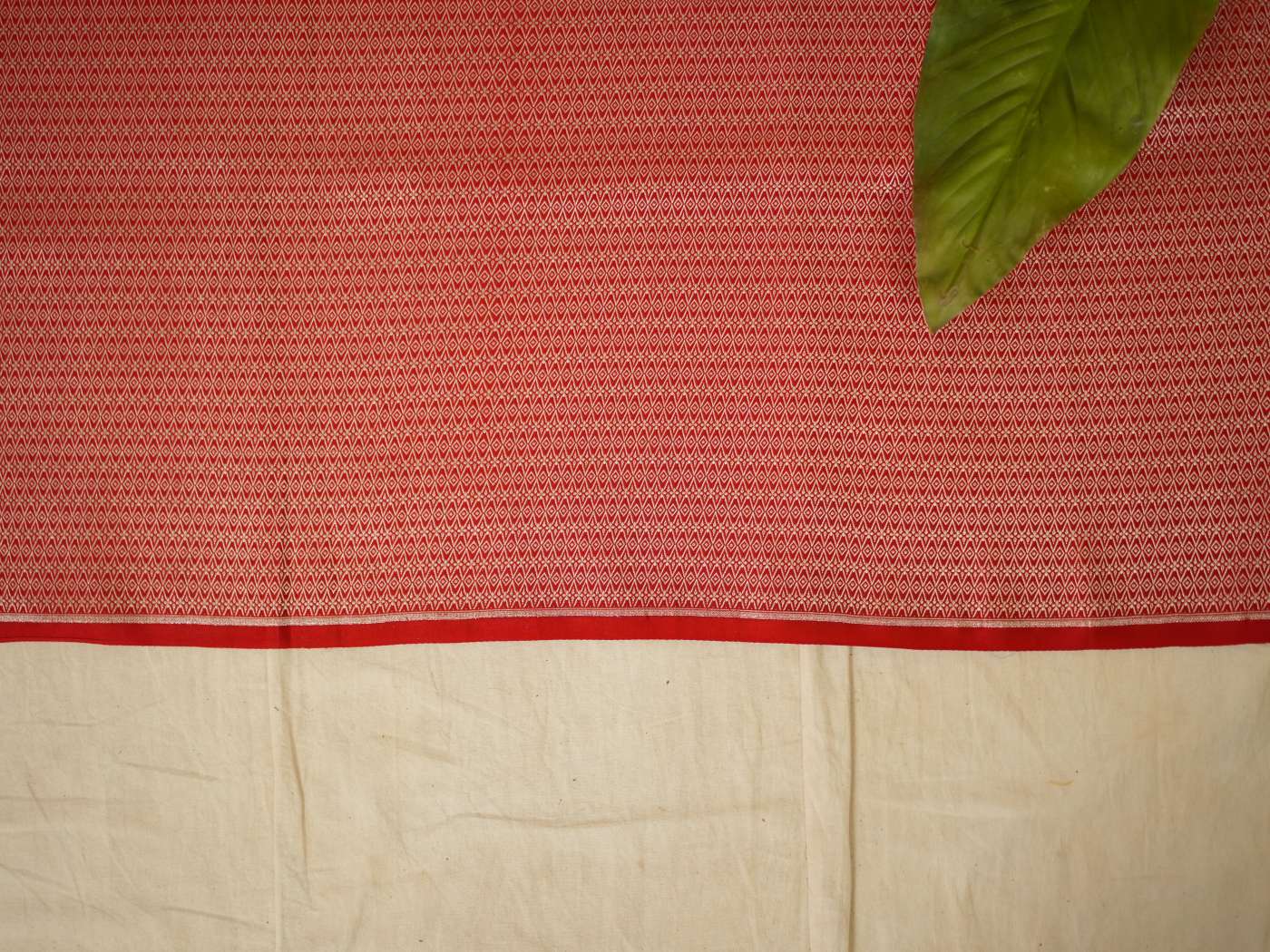 Grey semi Benarasi silk saree with intricate patterns and matching blouse piece from Joyee Kolkata.