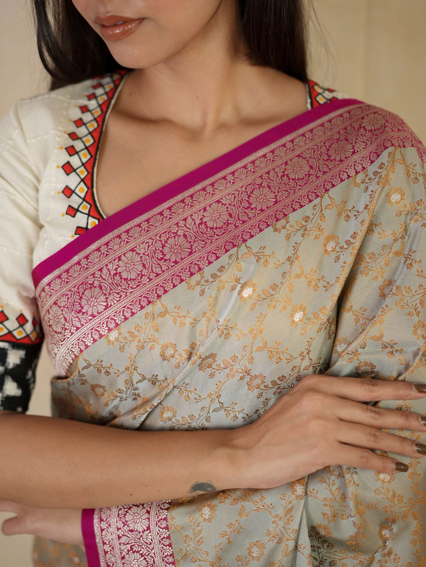 Grey semi Benarasi silk saree with intricate patterns and matching blouse piece from Joyee Kolkata, traditional Indian attire.