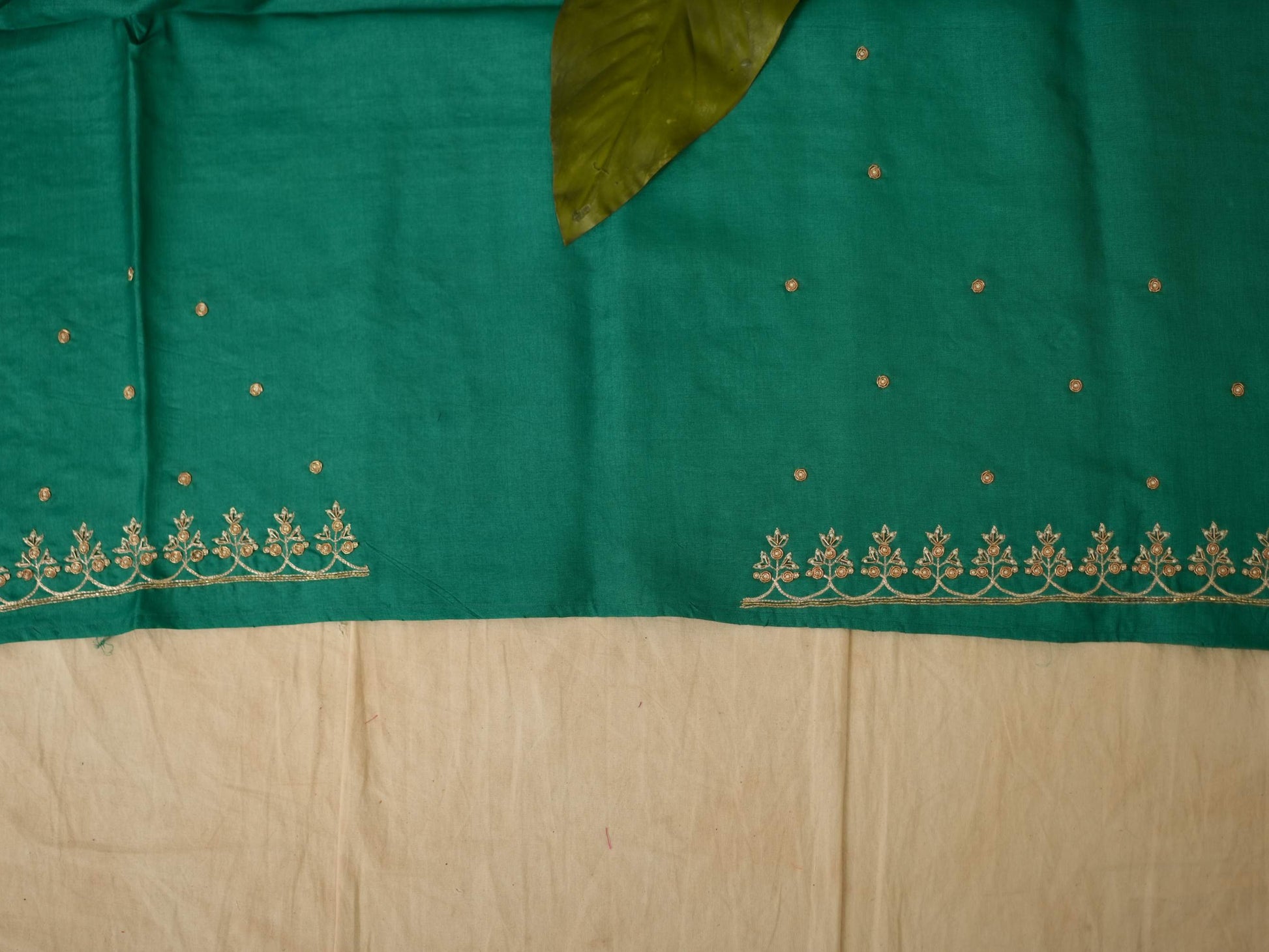Green Hand Zardosi Tussar Silk Saree with intricate embroidery and matching blouse piece, crafted by Joyee Kolkata.