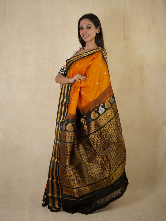 HANDWOVEN ORANGE COLOUR GADWAL SILK SAREE WITH 95 CM BLOUSE PIECE