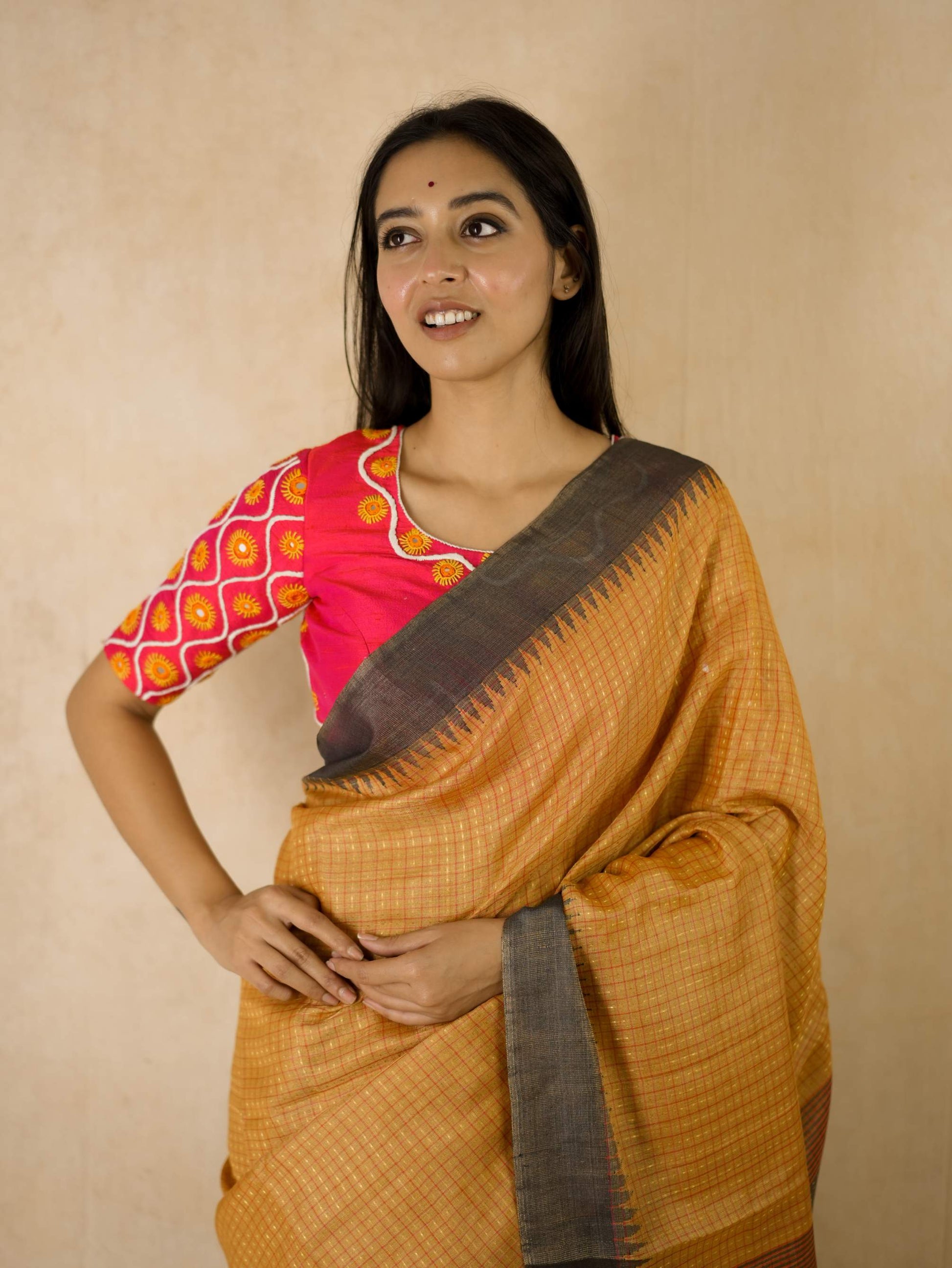 Handwoven yellow and golden dual-tone Kosa silk saree with intricate designs and a 90 cm blouse piece, by Joyee Kolkata.
