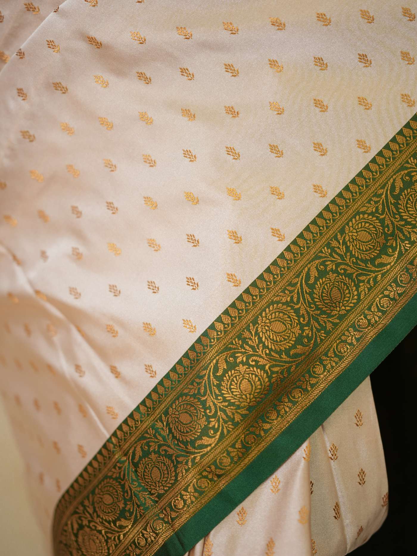 Cream Off-White semi Benarasi silk saree with intricate patterns and matching 88 cm blouse piece from Joyee Kolkata.