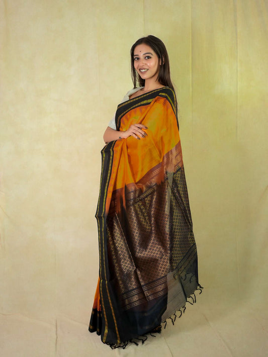 Orange Kanchipuram silk saree by Joyee Kolkata with matching 86 cm blouse piece, detailed traditional woven design.