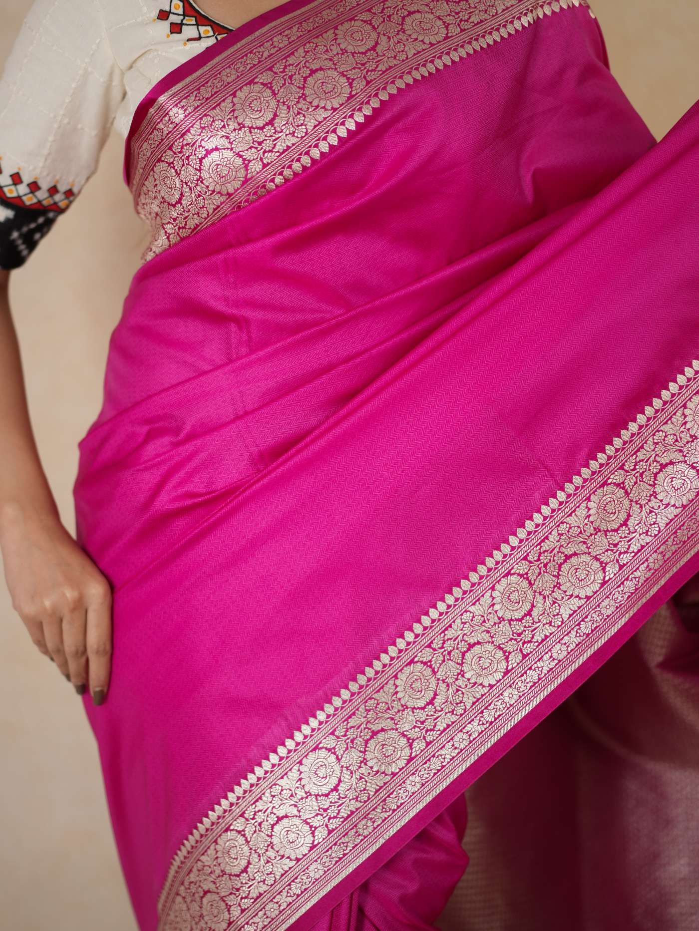 Pink Rani Benarasi semi-silk saree with intricate designs and 90 cm matching blouse piece from Joyee Kolkata.