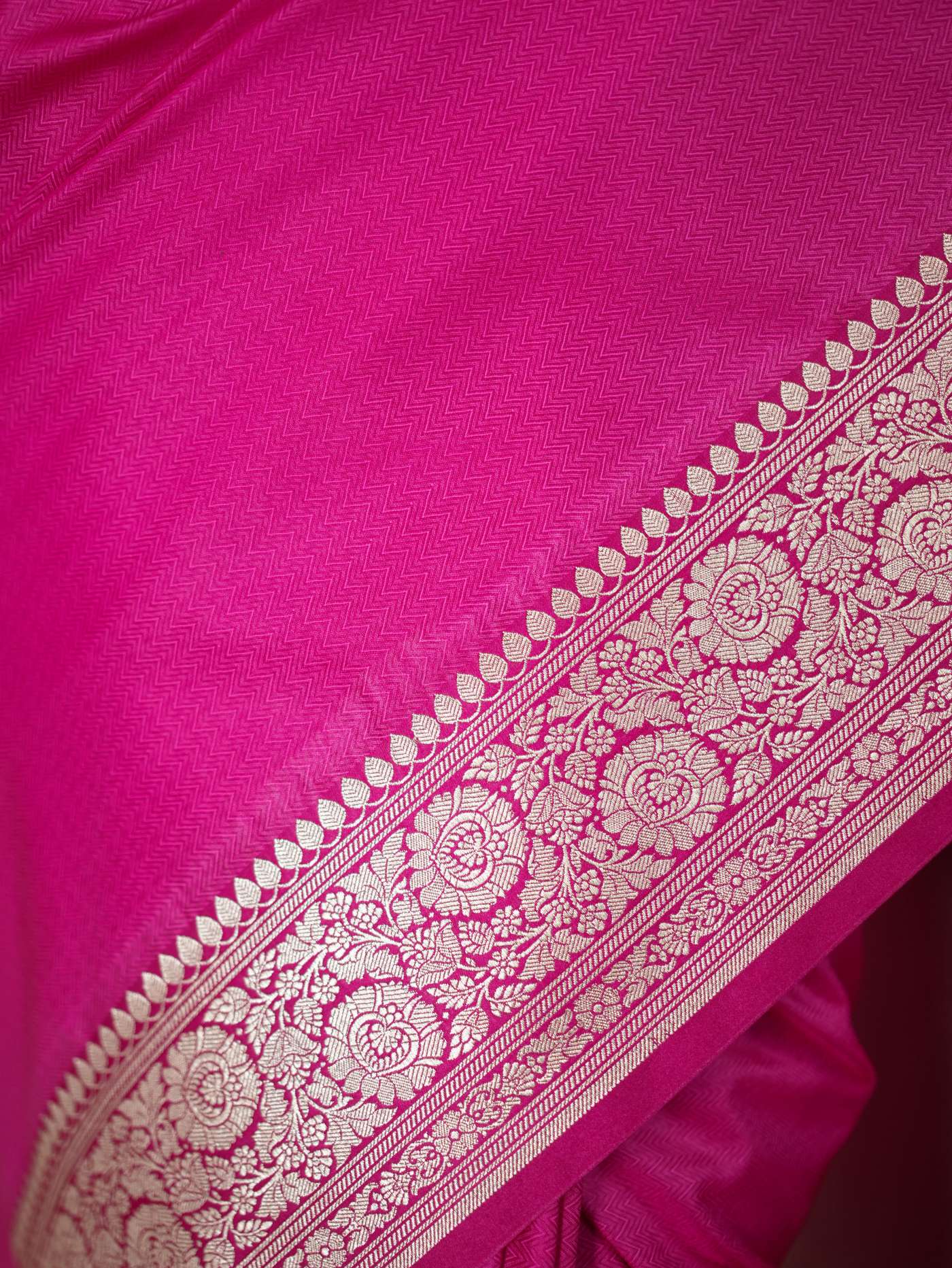 Pink Benarasi semi-silk saree with intricate gold zari work and matching 90 cm blouse piece, designed by Joyee Kolkata.
