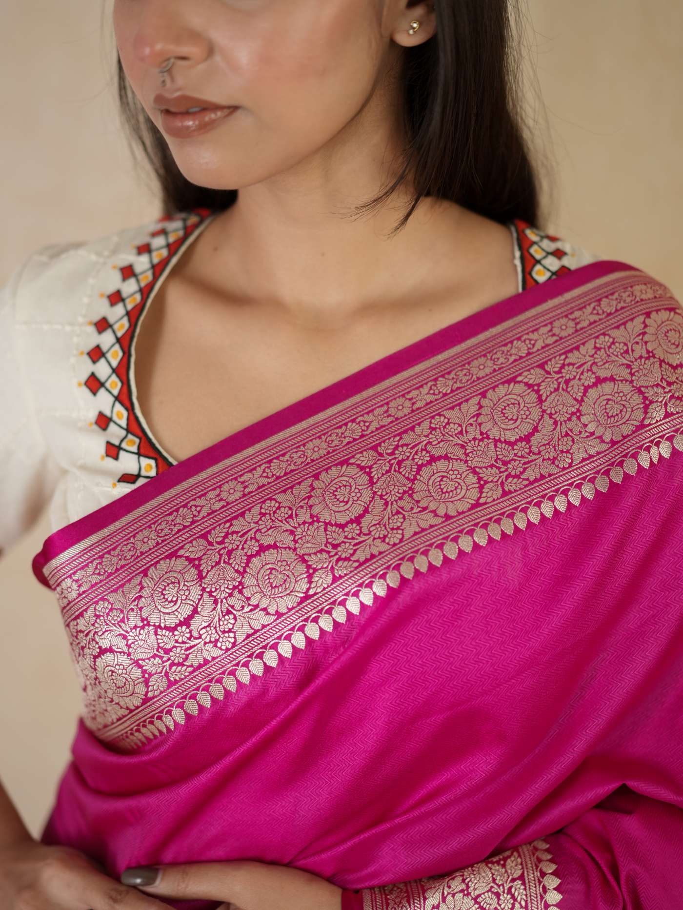Pink Benarasi semi-silk saree with intricate gold patterns and a 90 cm matching blouse piece from Joyee Kolkata.