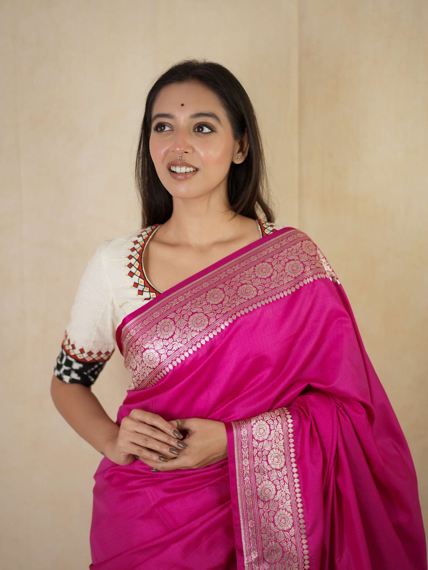 Pink Benarasi semi-silk saree with intricate patterns and matching 90 cm blouse piece from Joyee Kolkata.