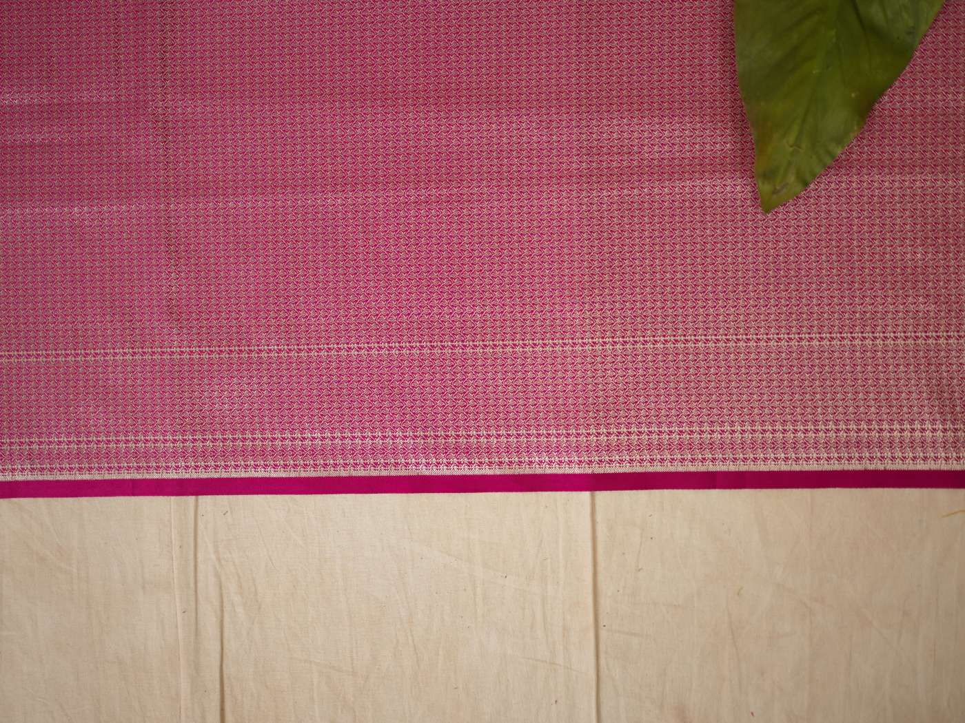 Pink Benarasi semi-silk saree with intricate patterns and a 90 cm matching blouse piece from Joyee Kolkata.