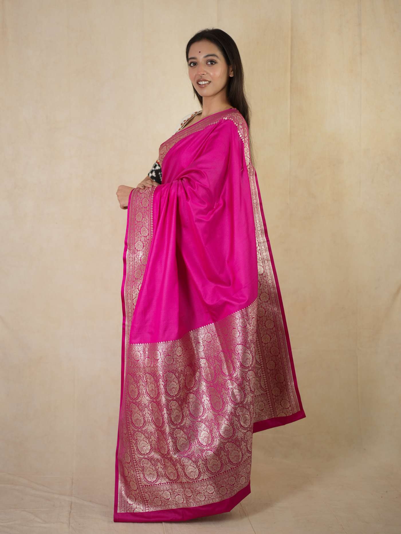 Pink Benarasi semi-silk saree with intricate gold designs and matching 90 cm blouse piece from Joyee Kolkata.