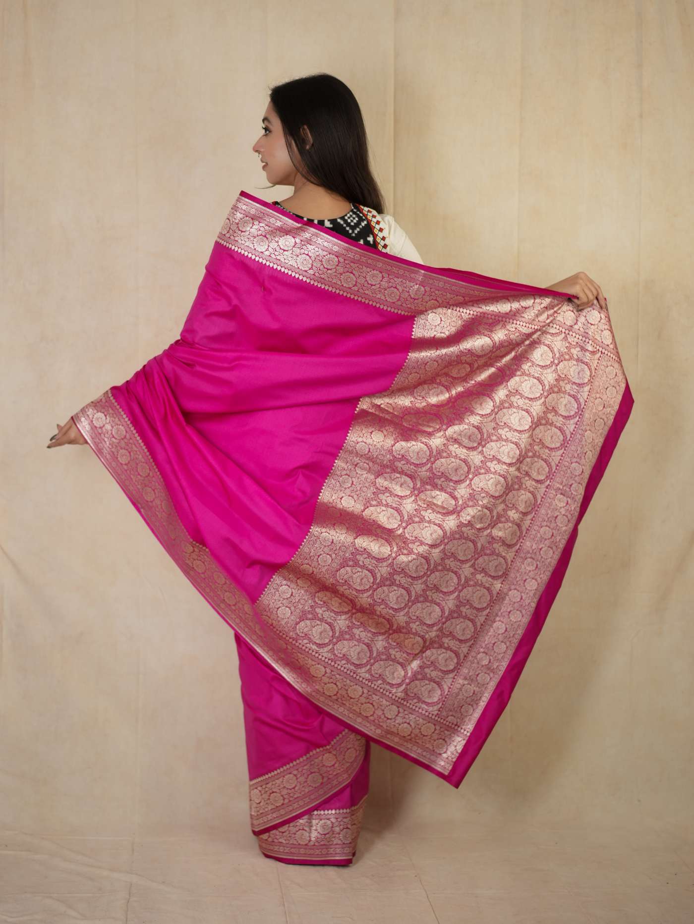 Pink Benarasi semi silk saree with intricate patterns and a 90 cm blouse piece from Joyee Kolkata.