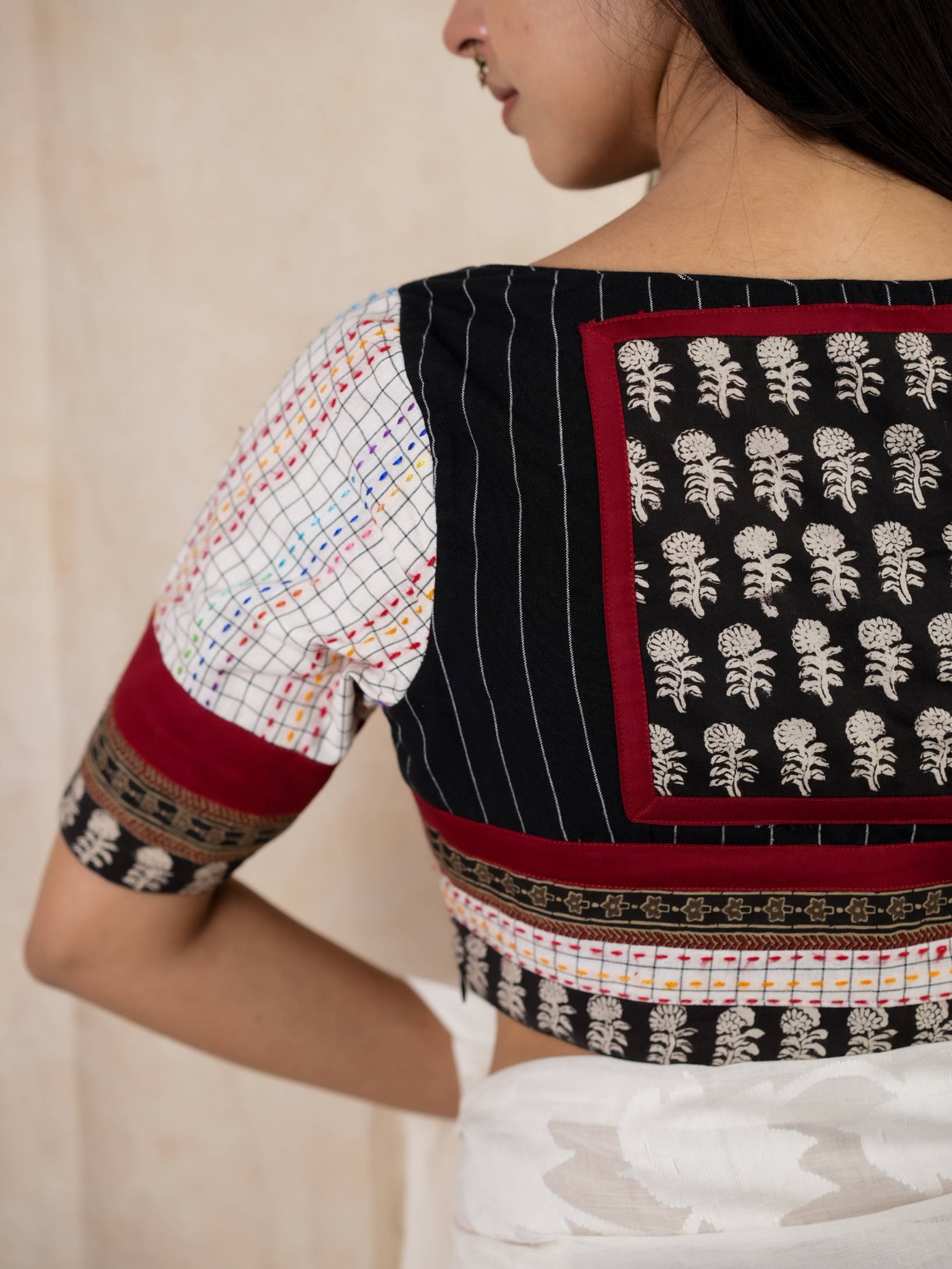 Colorful BAHAAR floral accessory by Joyee Kolkata with intricate embroidery and vibrant design, ideal for traditional celebrations.