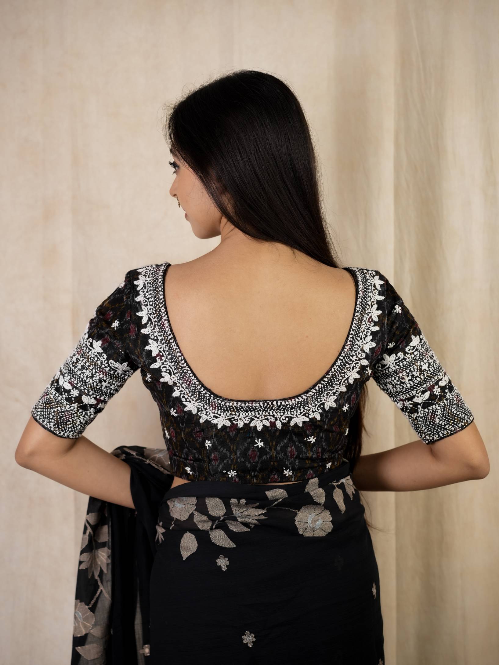 JoyeeKolkata SUDHA variable product with colorful fabric and intricate design, displayed on a plain background.