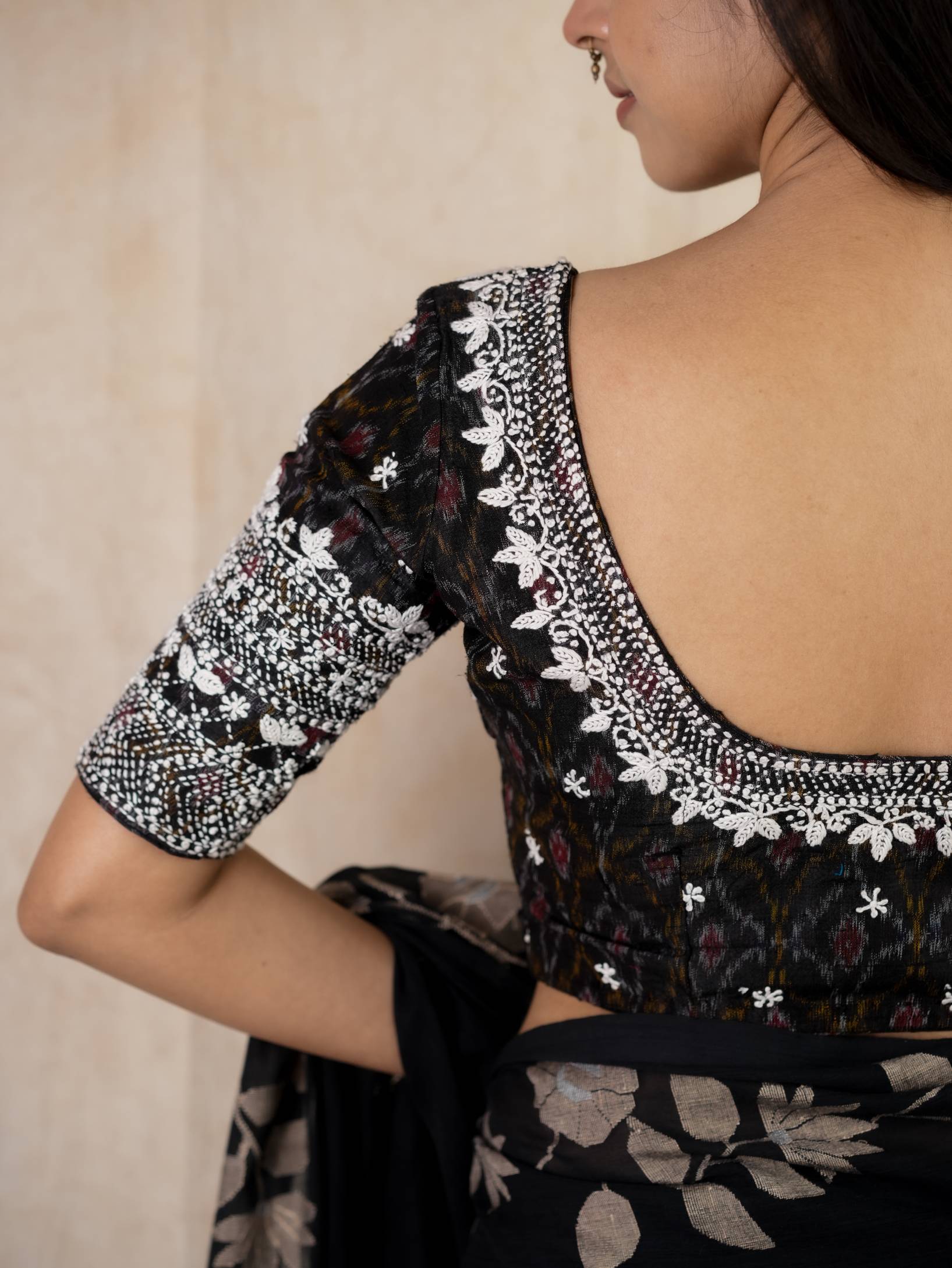 JoyeeKolkata SUDHA variable product with colorful fabric and intricate design, showcasing traditional craftsmanship.