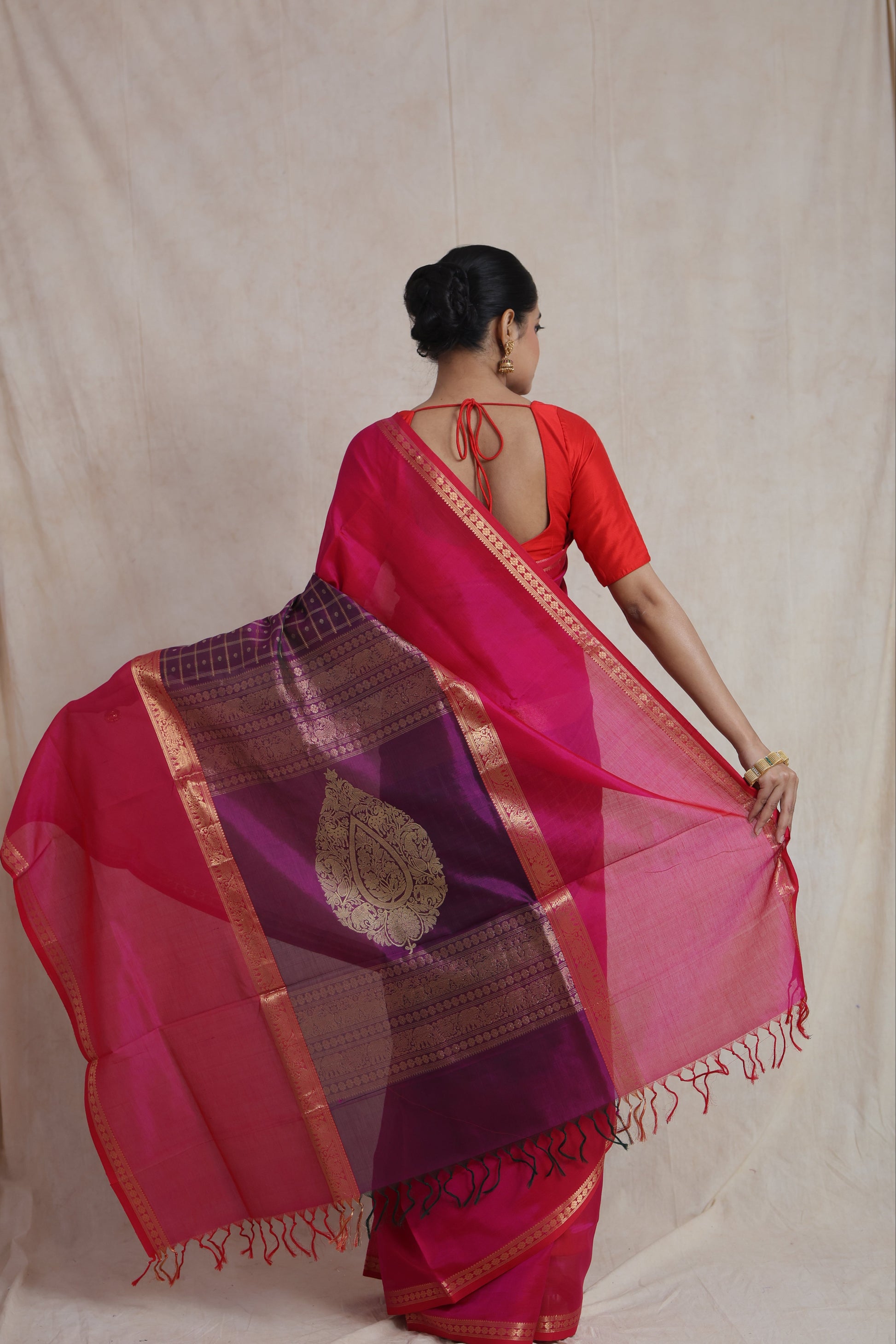 Back drape view of rani pink and purple Kanchipuram handloom Sico saree