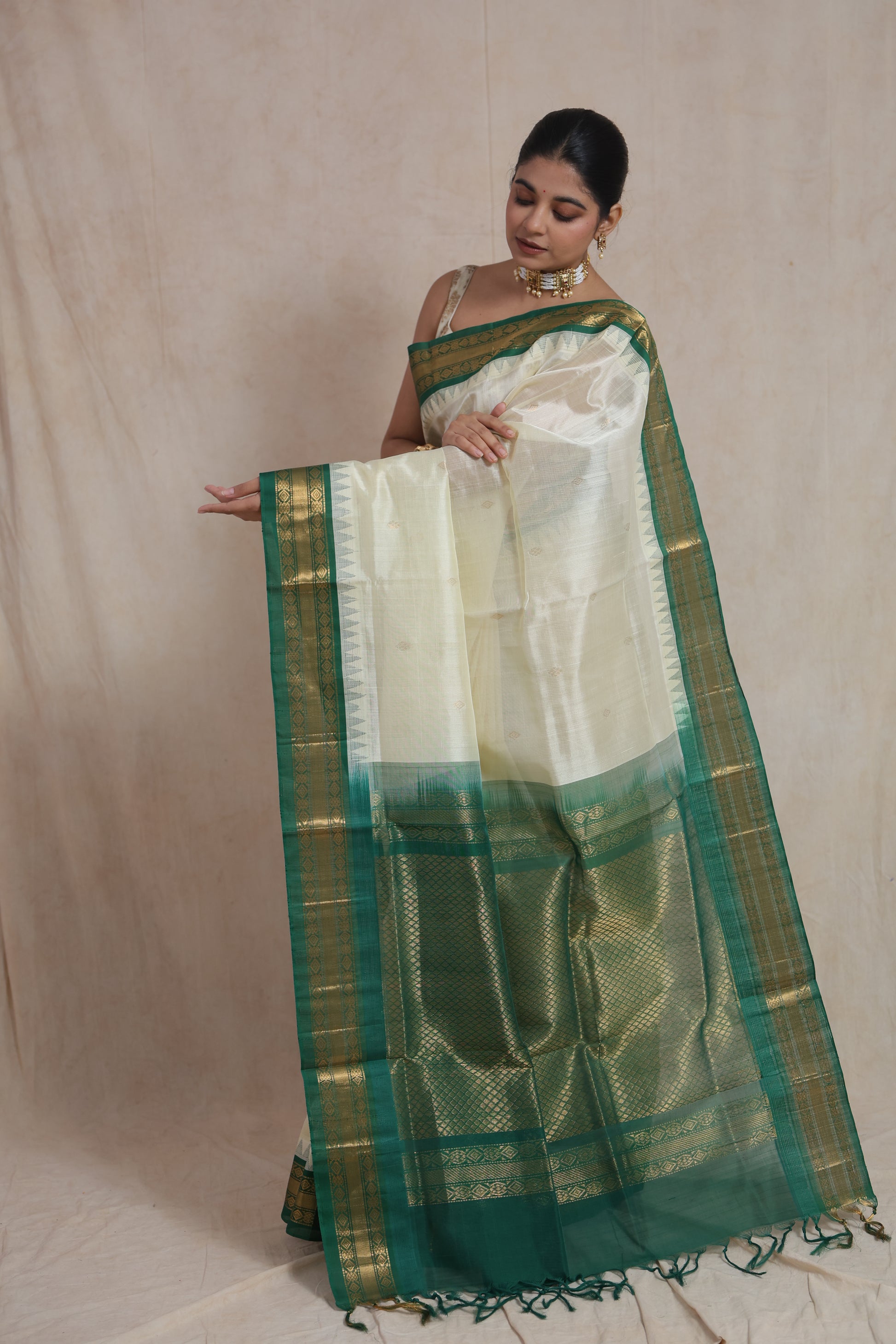 Classic ivory Kanchipuram silk cotton saree with green border