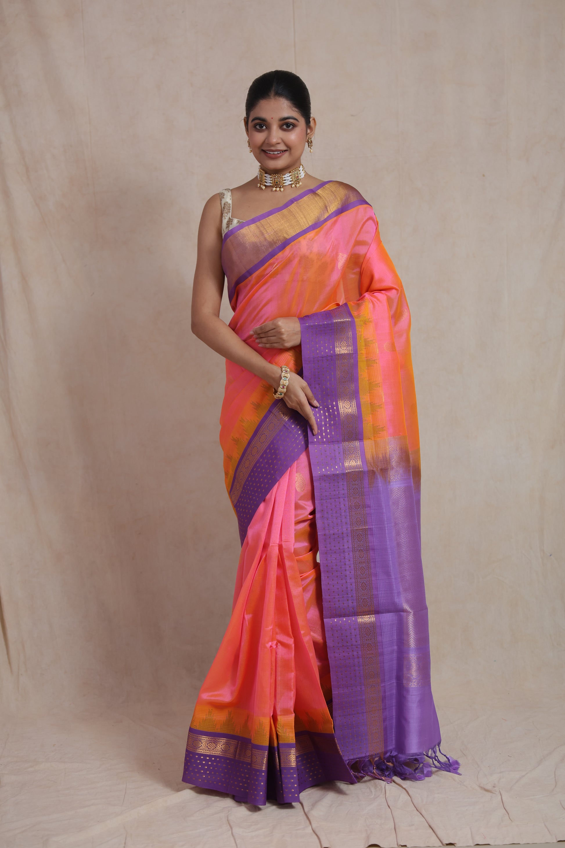 Full front look of coral pink Kanchipuram silk cotton saree