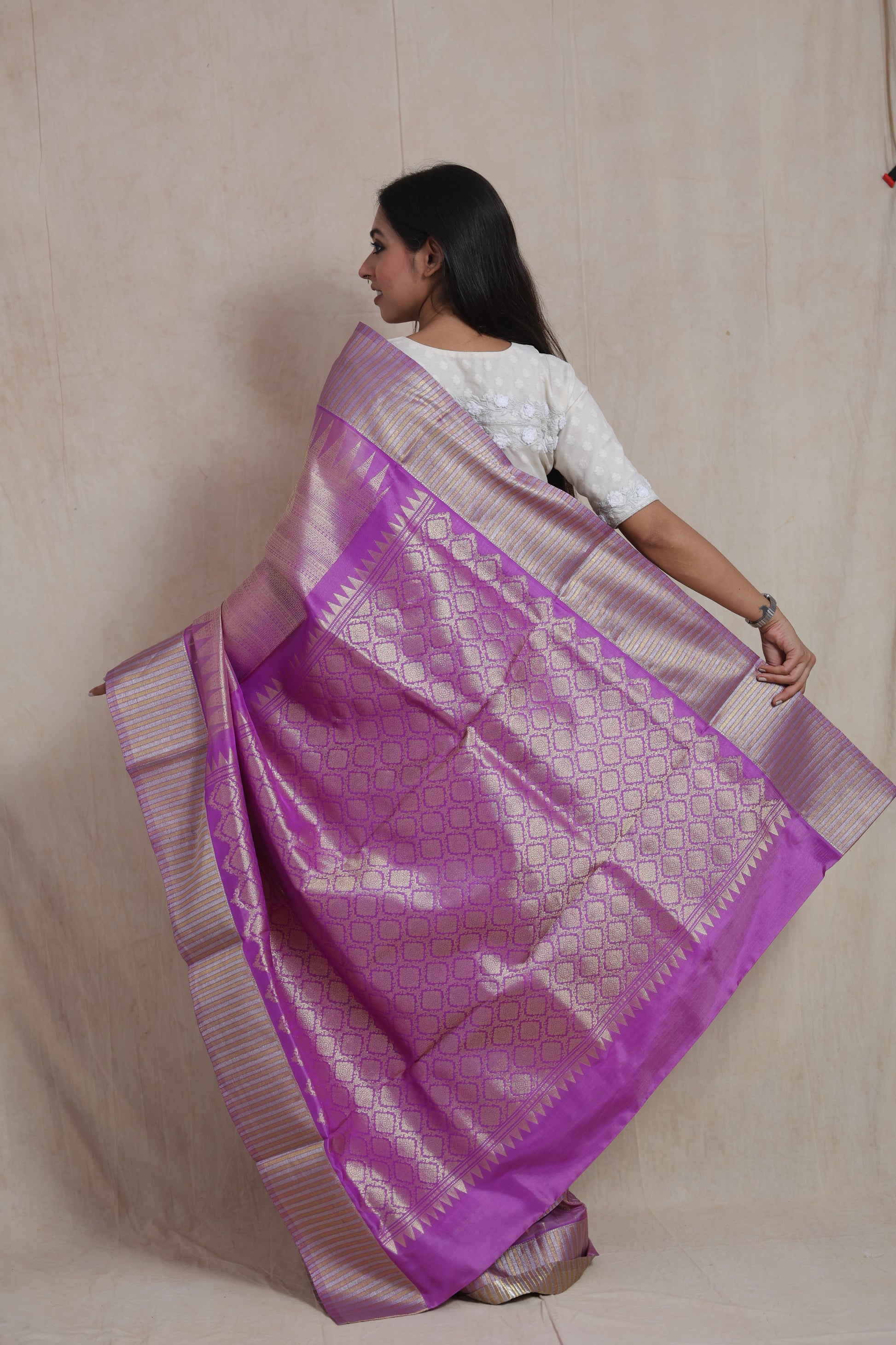 Back view of lavender Kanjivaram silk saree with rich gold zari woven pallu