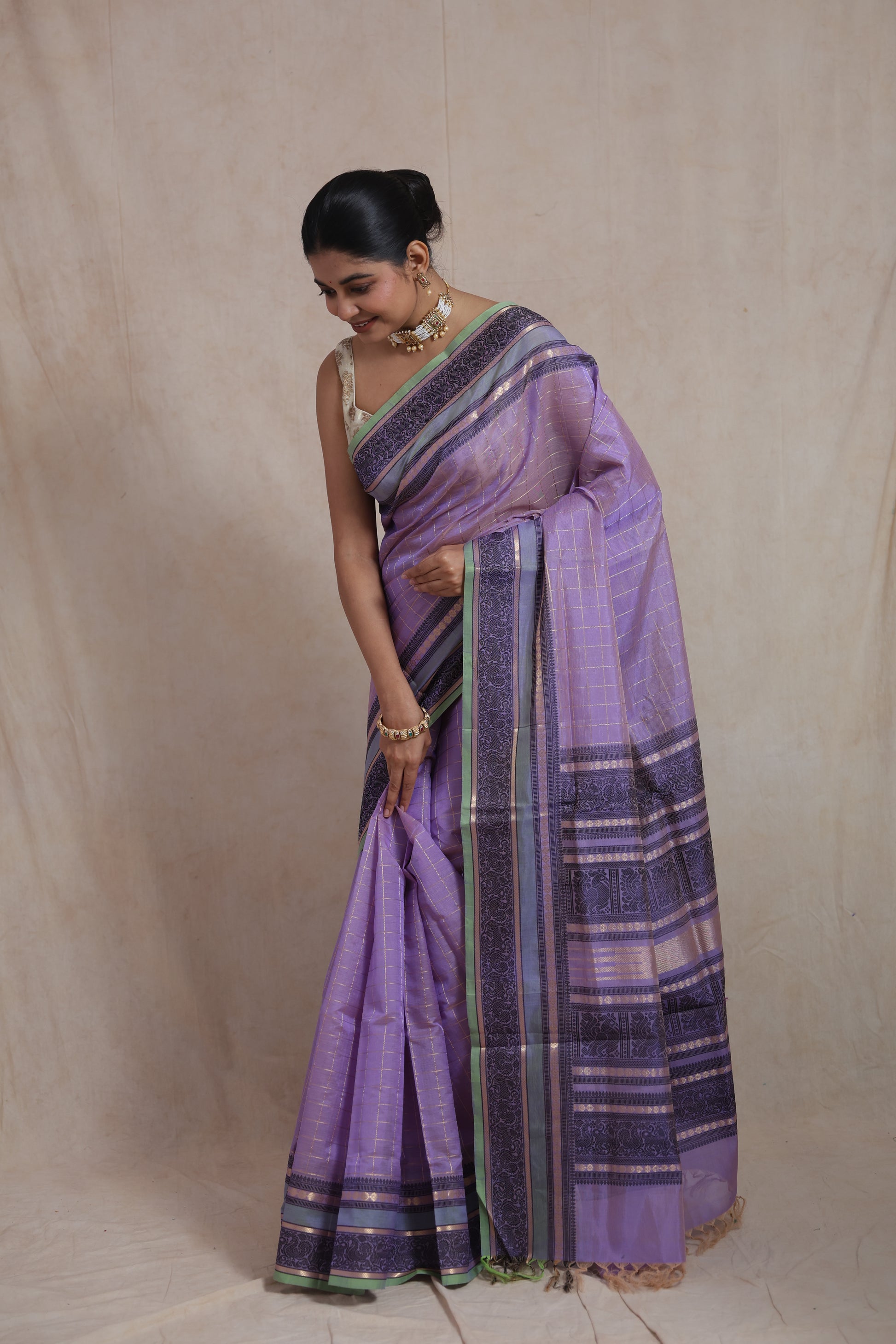 Elegant lavender Kanchipuram silk cotton saree with woven zari detailing