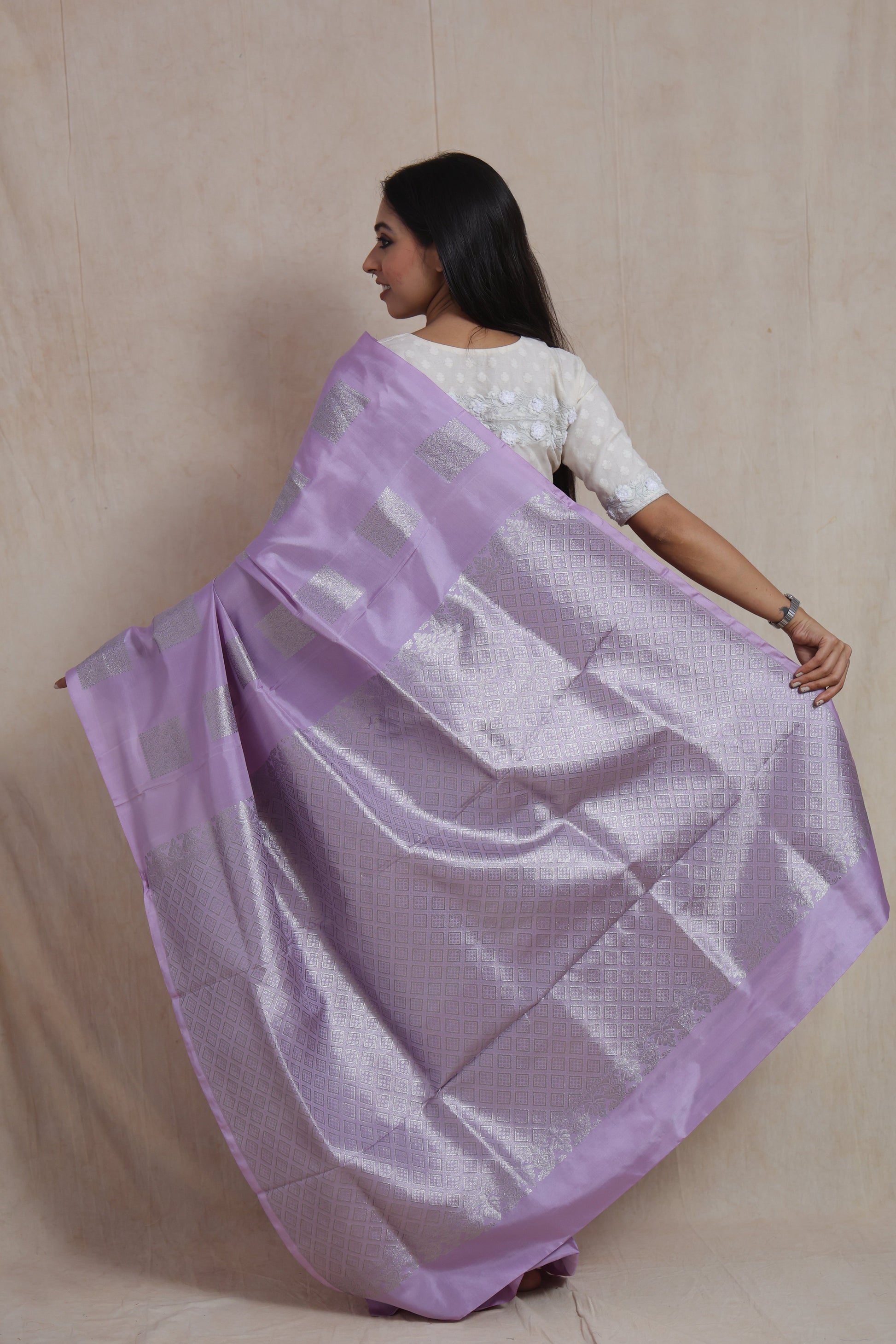 Back view of lavender Venkatgiri silk saree with rich zari pallu