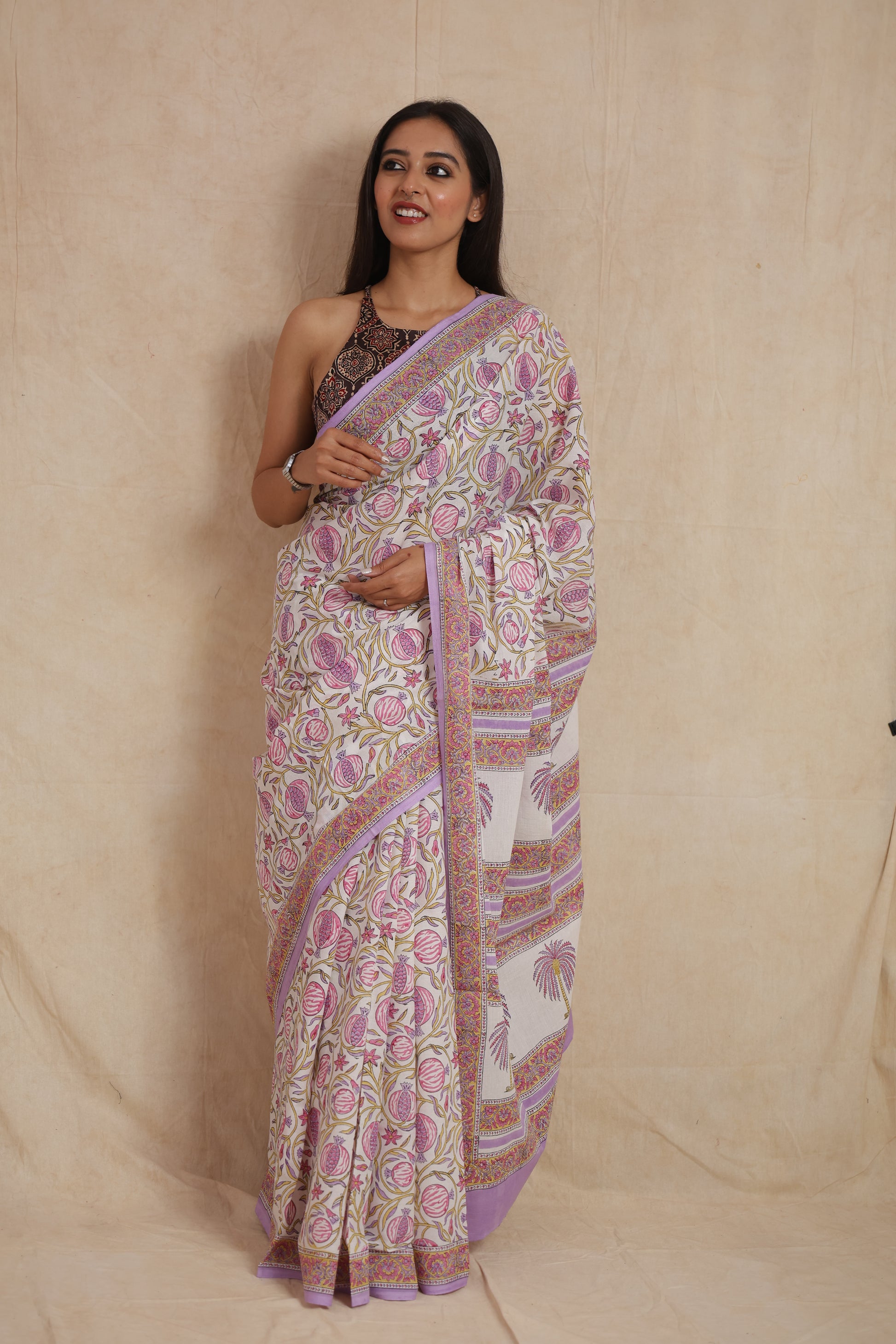Elegant ethnic styling in lilac floral Sanghnaree cotton saree