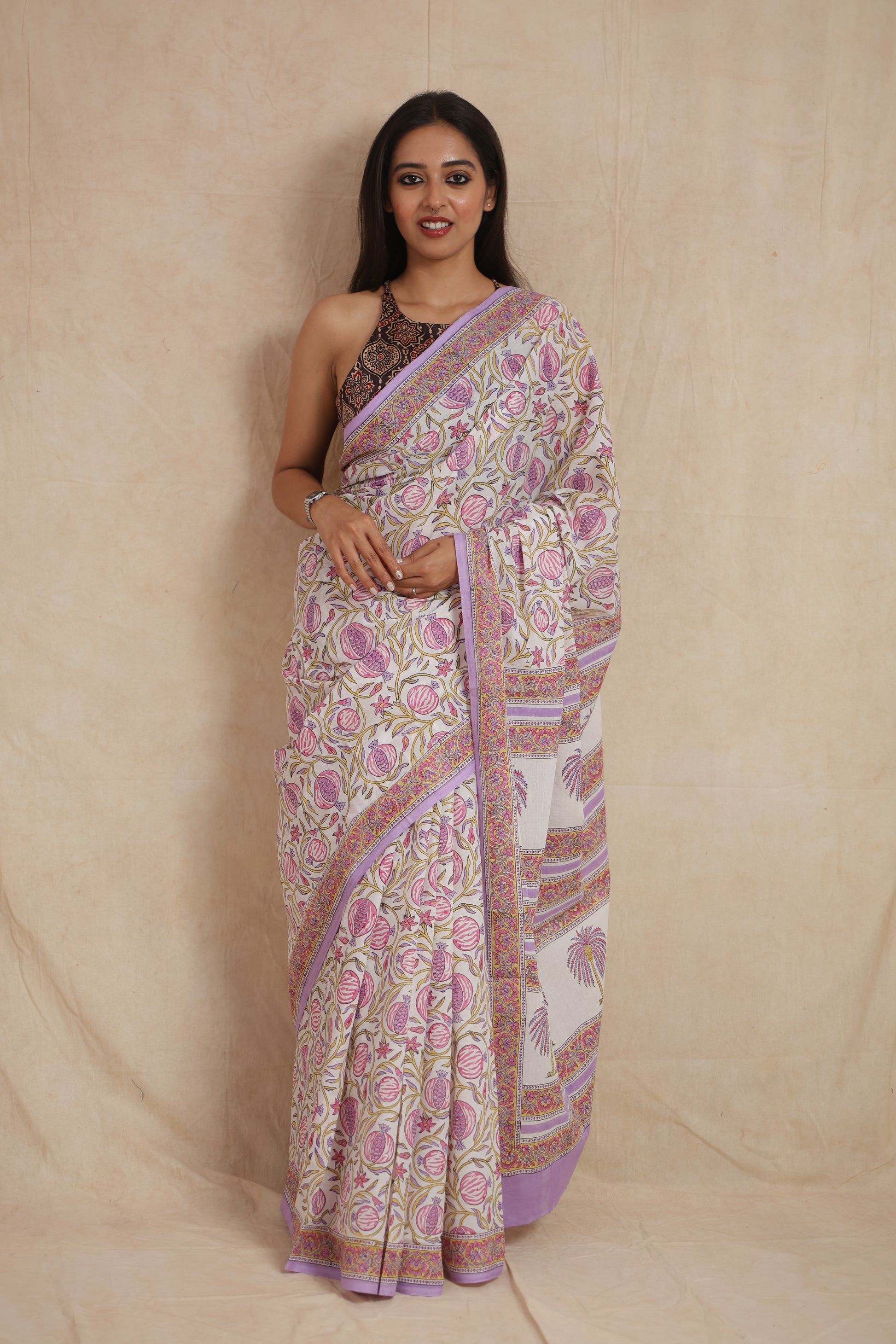 Model wearing lilac Sanghnaree cotton saree with floral print front view