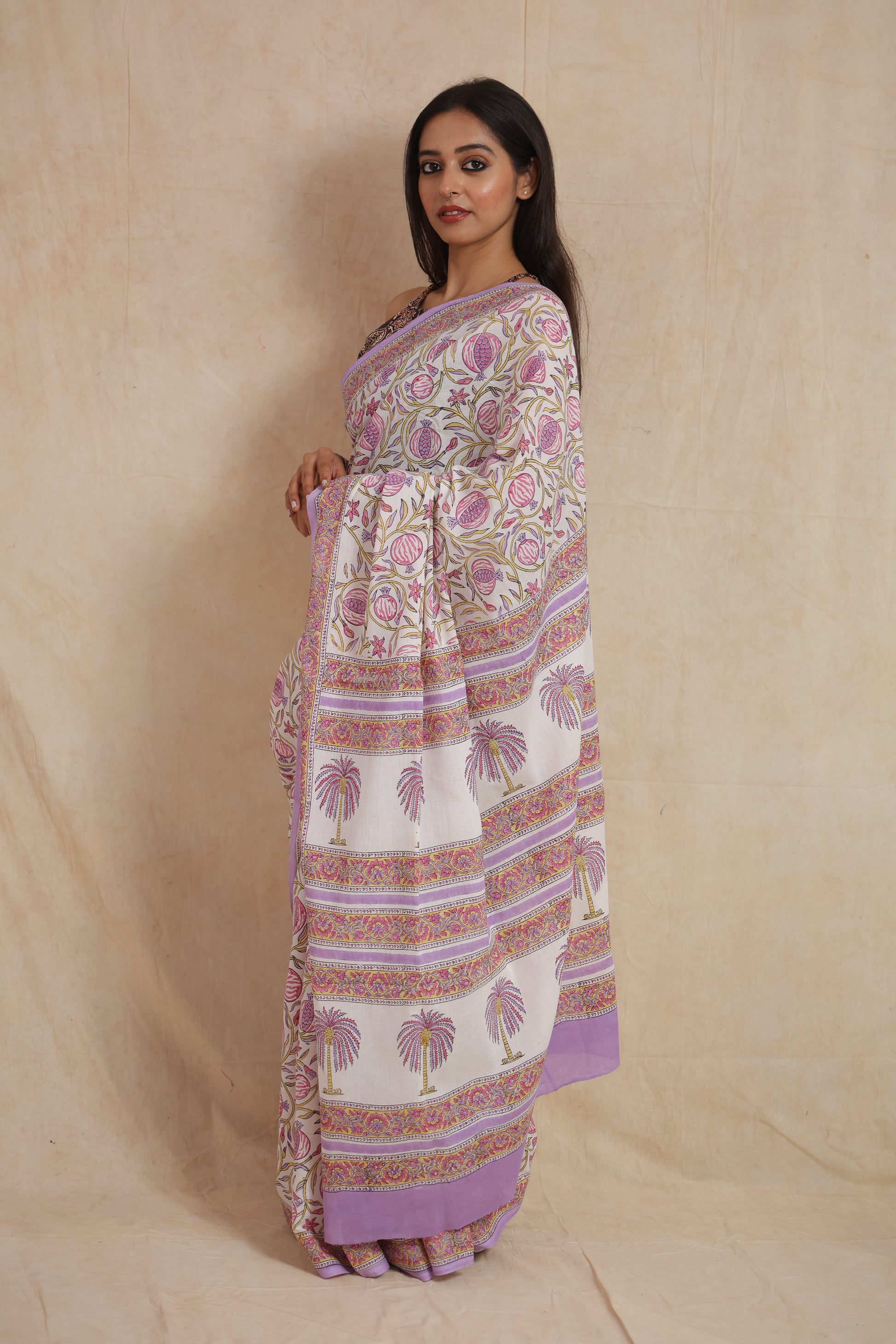 Side profile of lilac Sanghnaree cotton saree with palm motif pallu