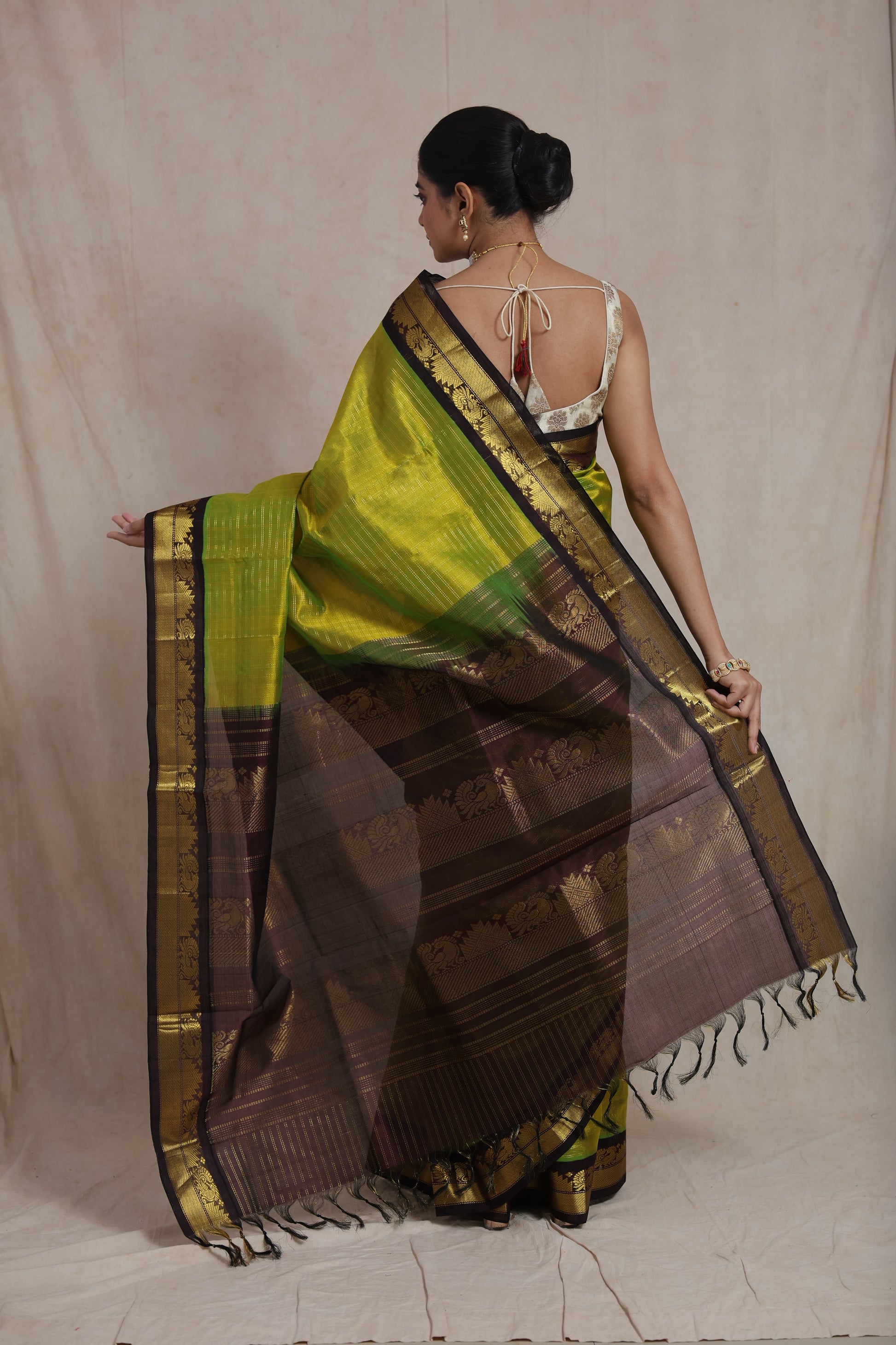 Back view of lime green Kanchipuram Sico saree with woven pallu