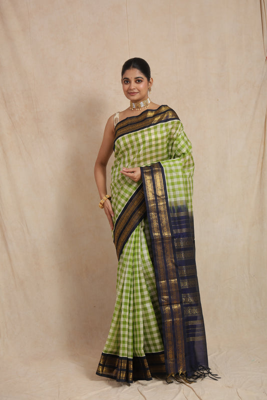 Full drape view of lime green checked Kanchipuram Sico saree with rich woven pallu