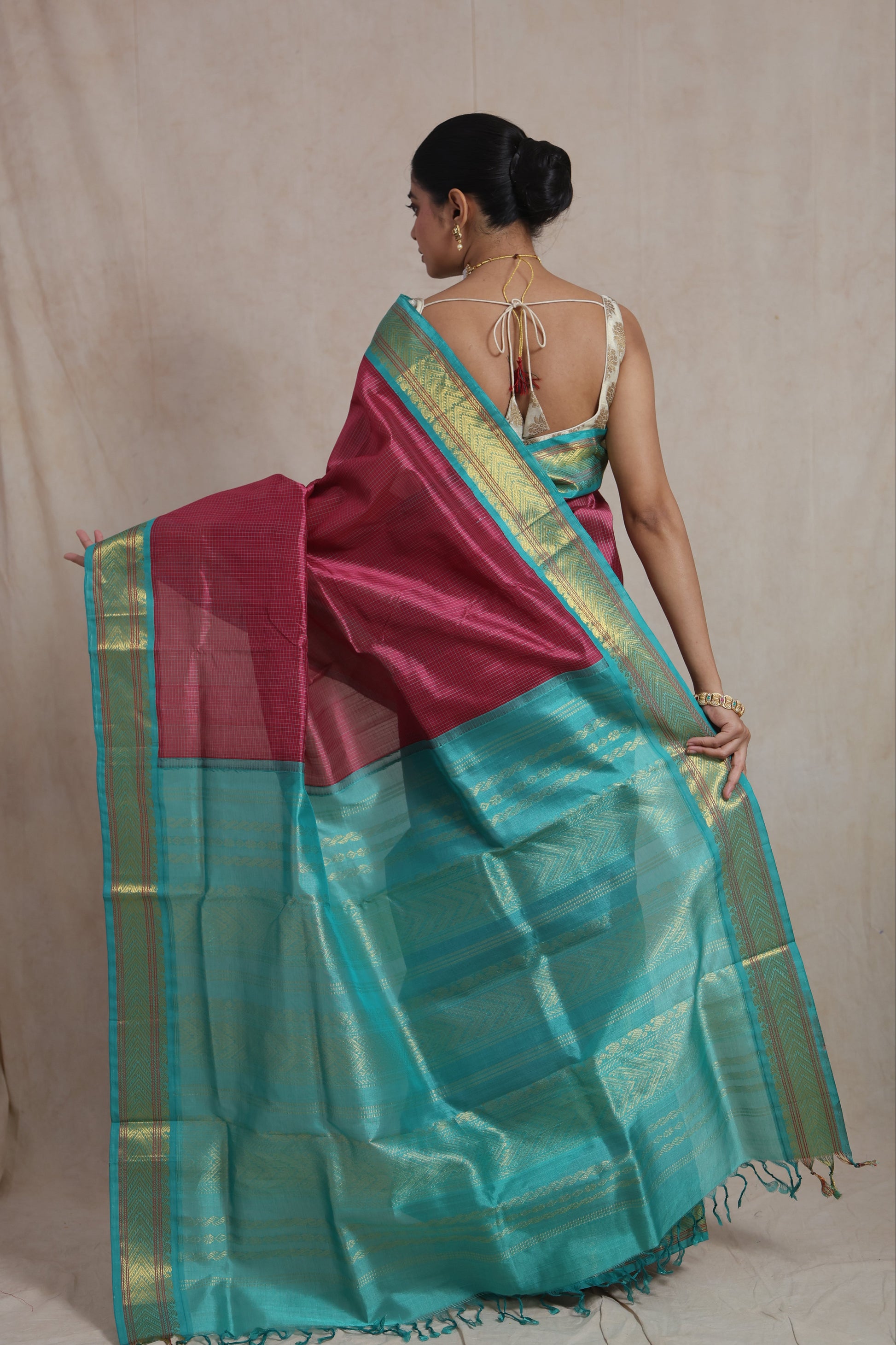 Front full view of magenta Kanchipuram silk cotton saree with zari border