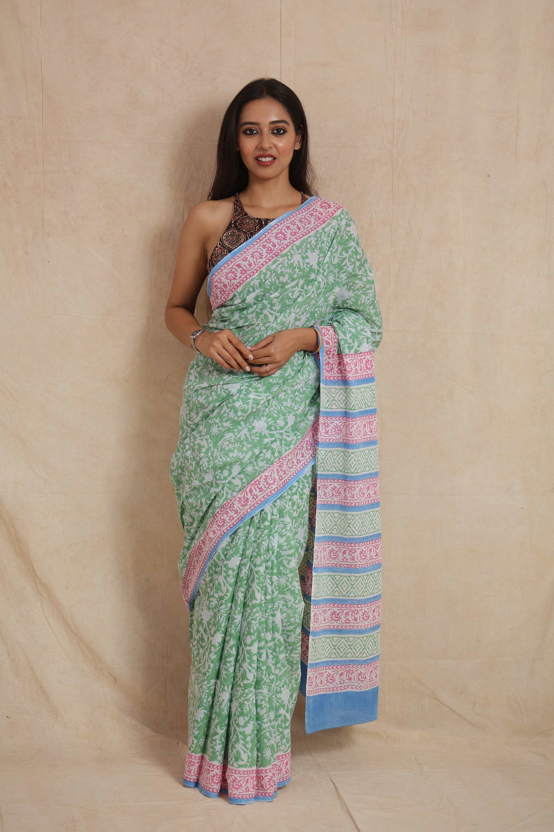 Full drape look of mint green Sanghnaree cotton saree with contrast pallu